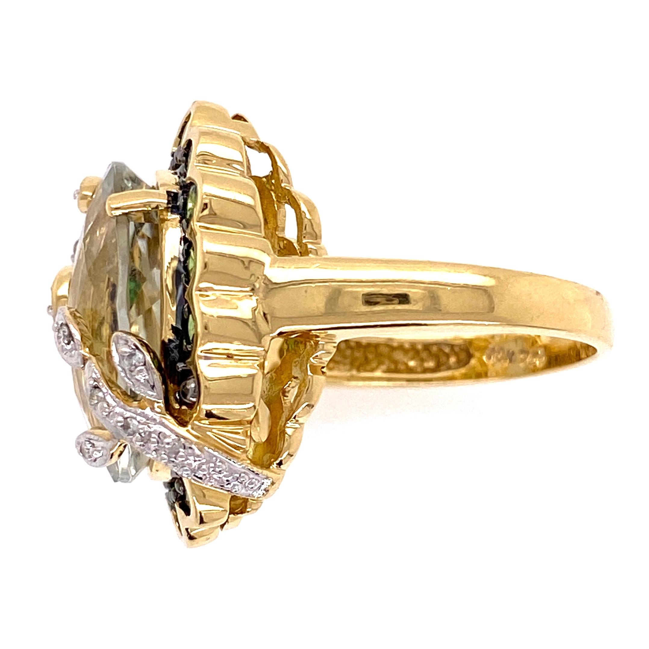 Fabulous Cocktail Ring. Center securely set with a 7 Carat Checkerboard Prasiolite, surrounded by Tsavorites and further enhanced with 0.16tw Diamonds. All stones are Hand set. Hand crafted mounting in rich 18K yellow Gold. Ring size 7.25. More