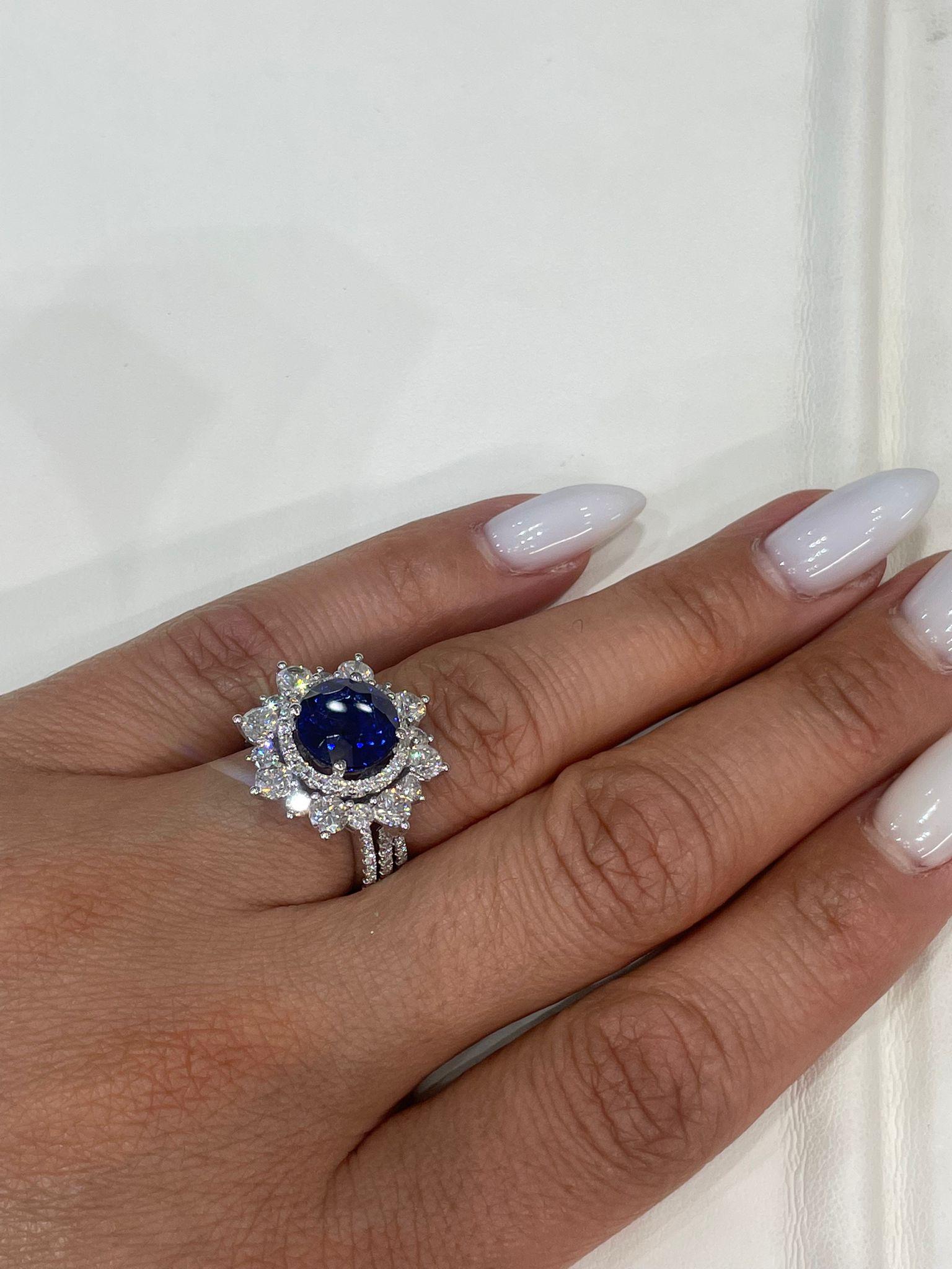Women's 7 Carat Round Brilliant Blue Sapphire Ring Certified For Sale