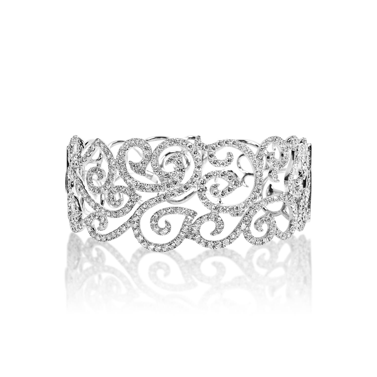 The PALMER 7.48 Carat Diamond Bangle Bracelet features Round DIAMONDS brilliants weighing a total of approximately 7.48 carats, set in 14K White Gold.

Style:
Diamonds
Diamond Size: 7.48 Carats
Diamond Shape: Round Brilliant Cut



Setting
Metal: 14