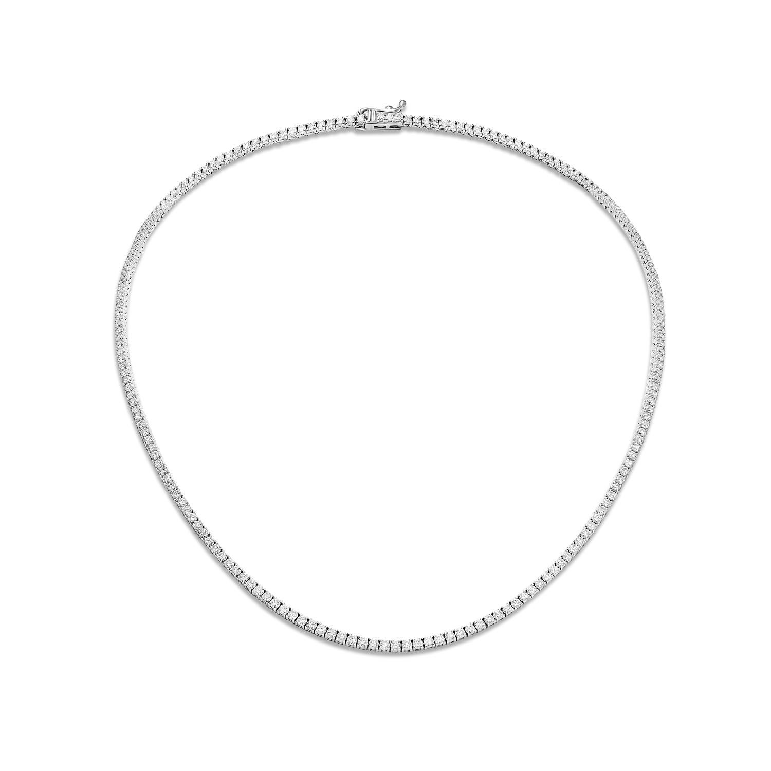 Made with lustrous round brilliant cut diamonds set in 14 karat white gold, this necklace offers unmatched beauty and glamour. Whether you're looking to add a touch of sophistication to your formal outfit or simply want to add some sparkle to your