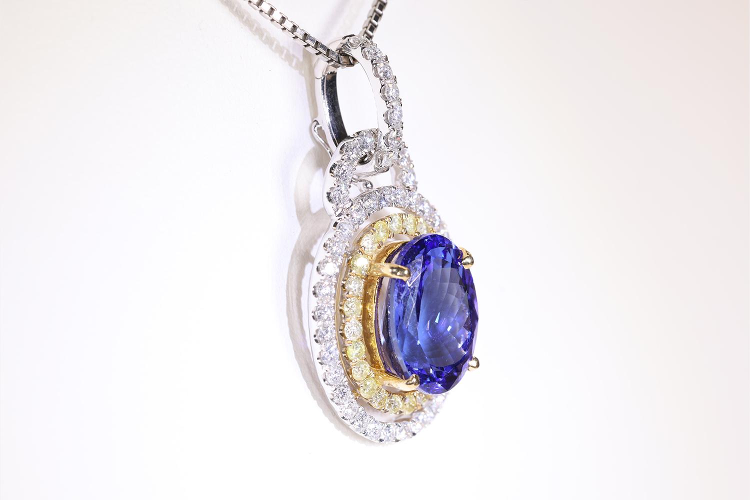 Oval Cut 7 Carat Tanzanite Pendant with White & Yellow Diamonds Set in 2 Tone 18K Gold For Sale