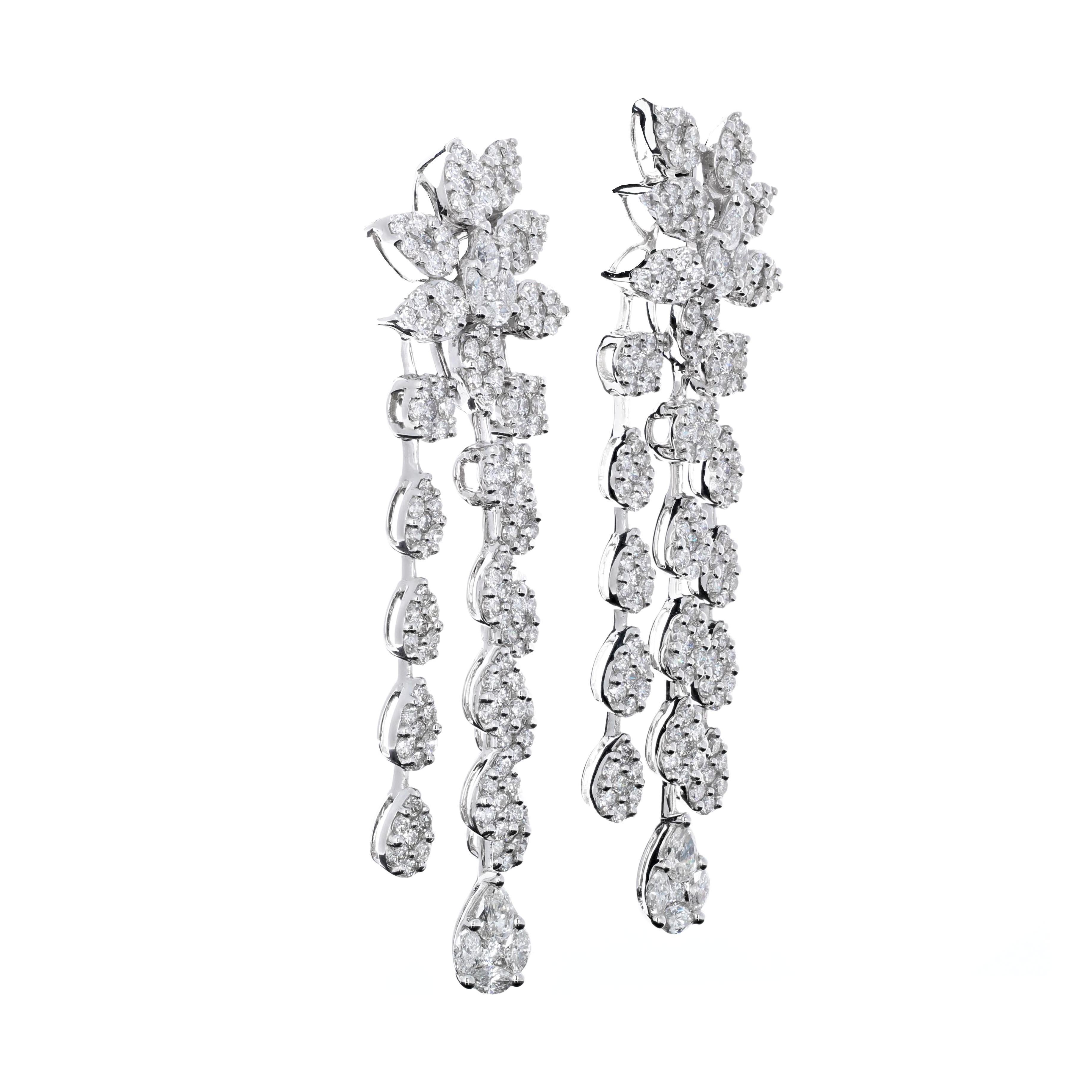 Hand made 18 karat white gold dangling chandelier diamond earrings. These earrings are what is refered to as an 
