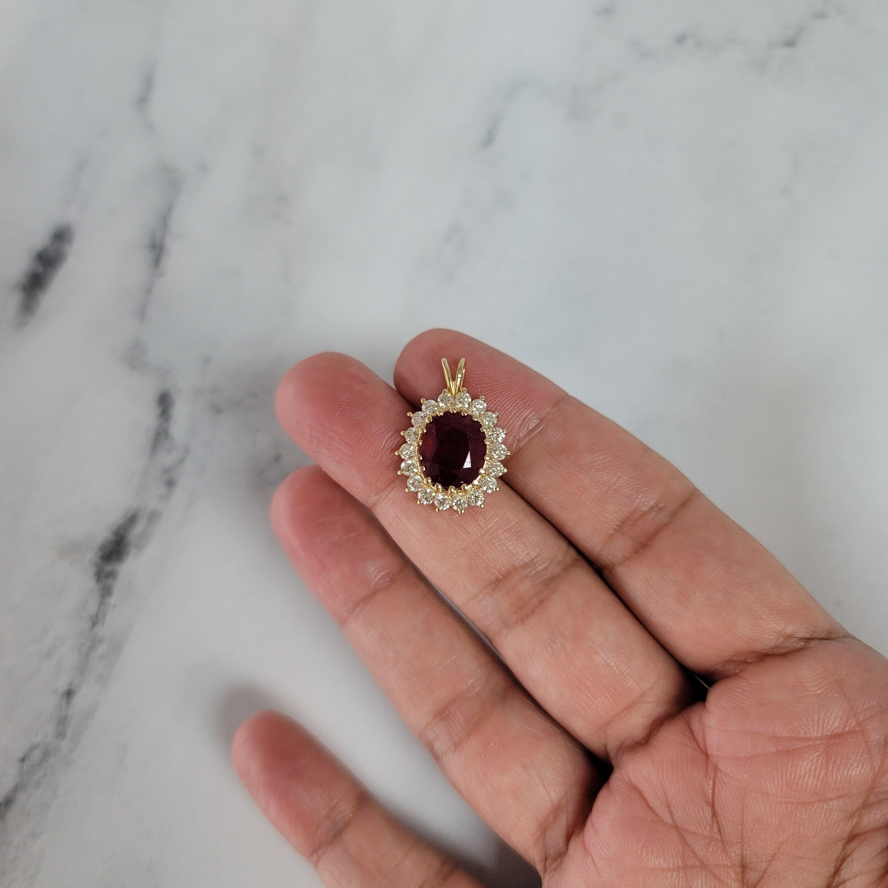 Oval Cut 7 Carat Treated Oval Ruby Diamond Halo Necklace For Sale