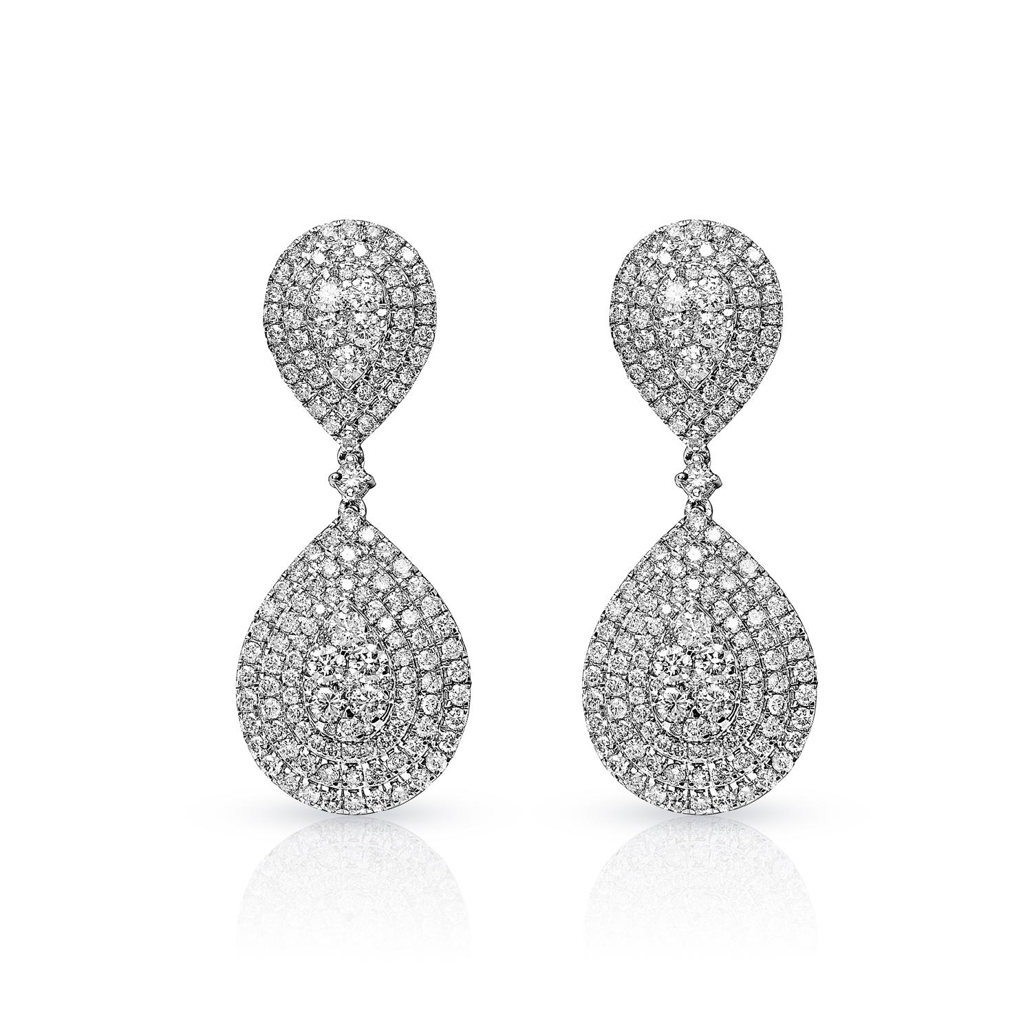 Diamond teardrop earrings for women that are sure to make a statement. These earrings are both modern and elegant, with pave diamonds, creating a highly polished look that is both feminine and strong. The square clear stones add a vintage elegance