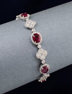 7 carats Ruby Bracelet with Diamond medallions in 18 karat white gold