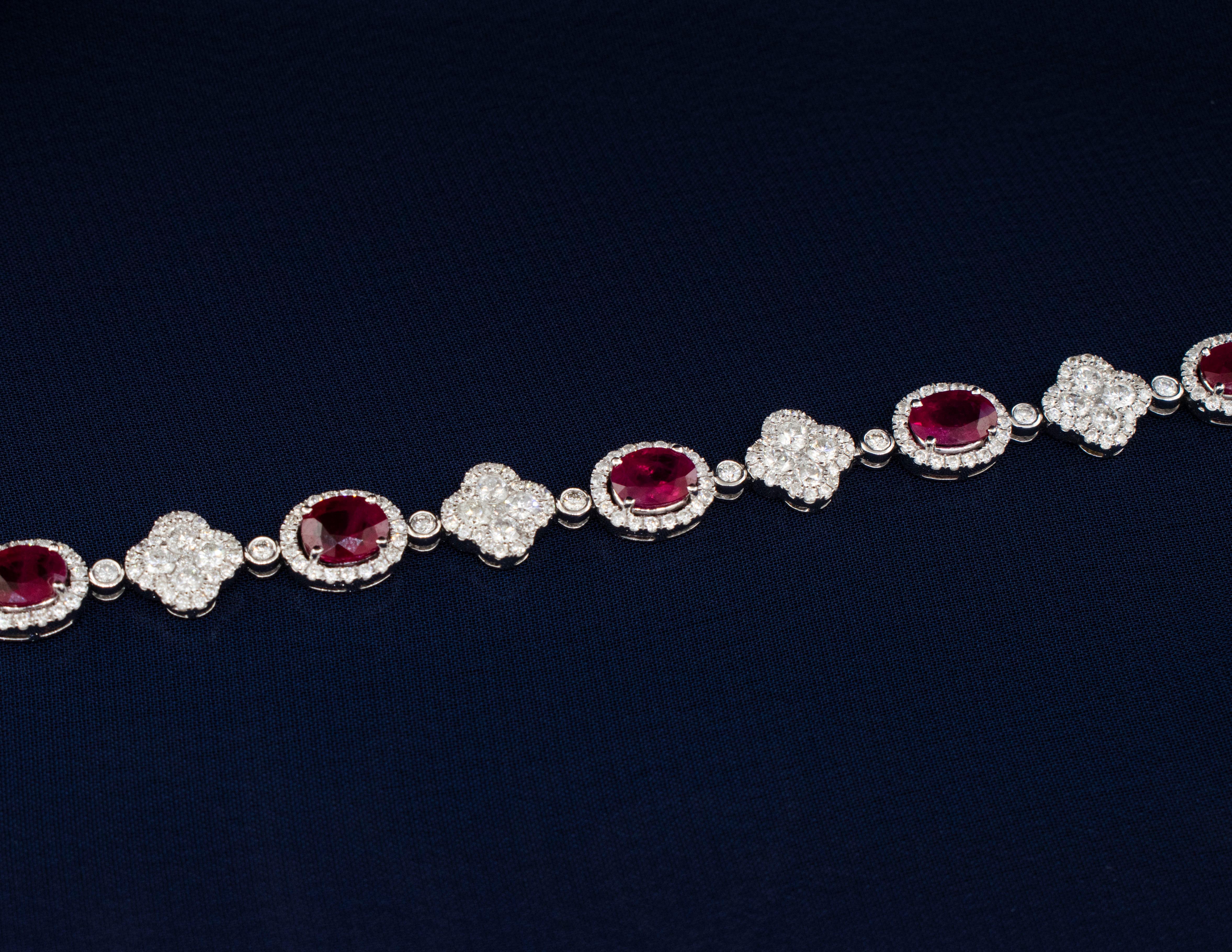 Oval Cut 7 carats Ruby Bracelet with Diamond medallions in 18 karat white gold For Sale