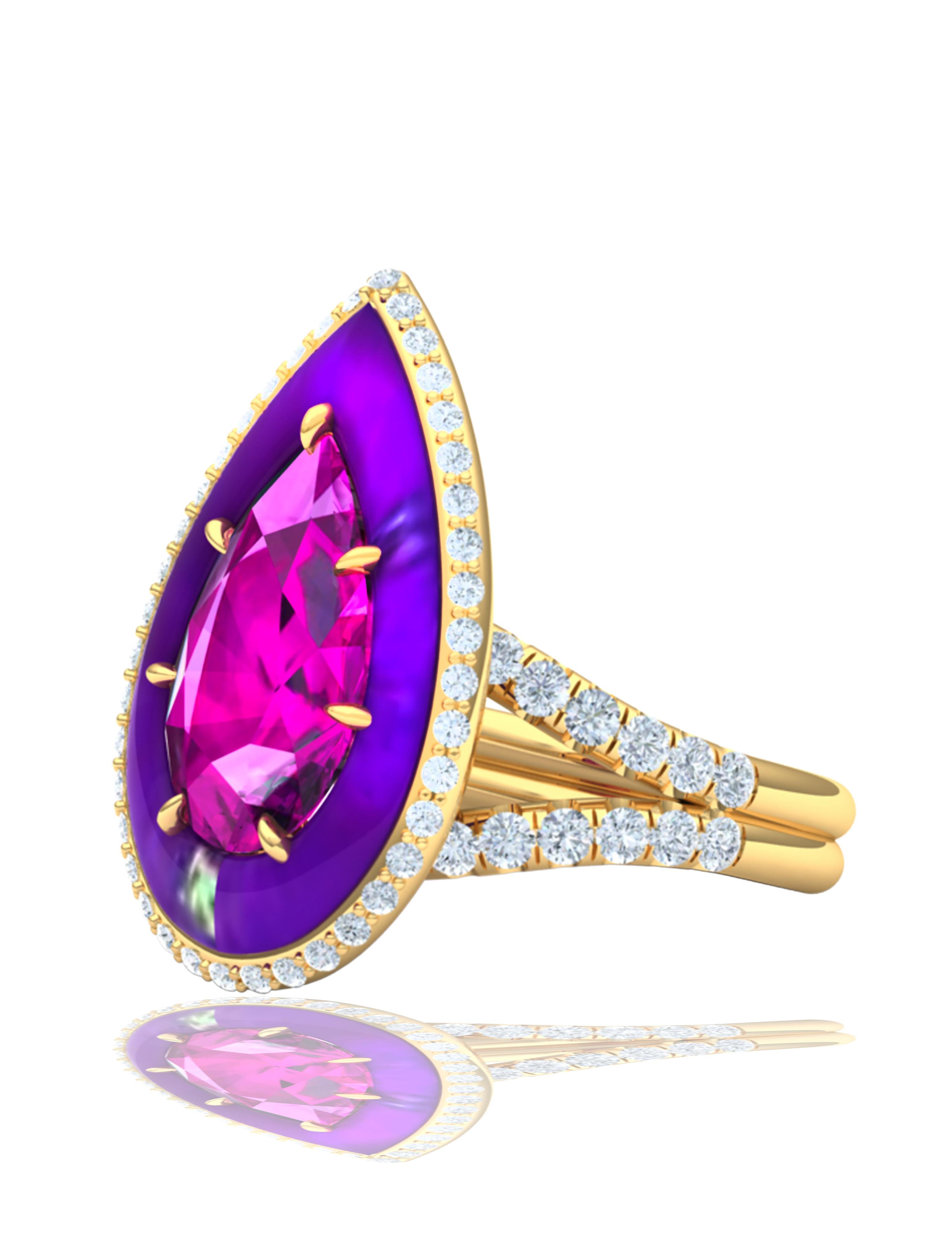 This stunning pear shape tourmaline has a electric magenta pink color with purple undertones.  The center stone weighs apprx. 5 carats and has SI clarity.  The center stone is surrounded by a custom cut piece of Sugilite that has a rich even purple
