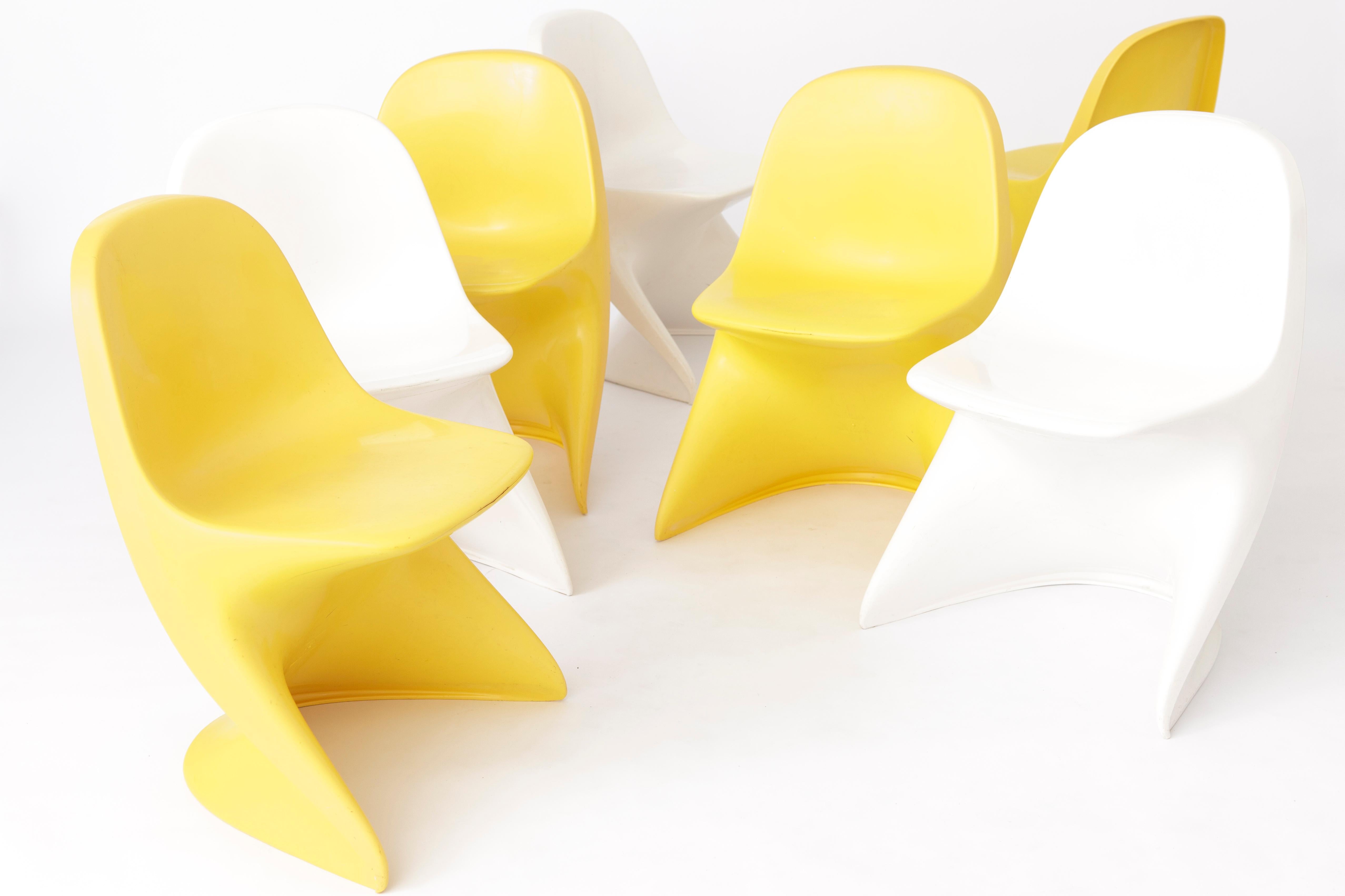 7 plastic chairs for kids, model Cassalino from the German producer Casala. 
Production period: 1970s. Design by Alexander Begge. 
Displayed price is for 7 chairs. The large chair in the first photo with metal 
elements is not part of the set. It's
