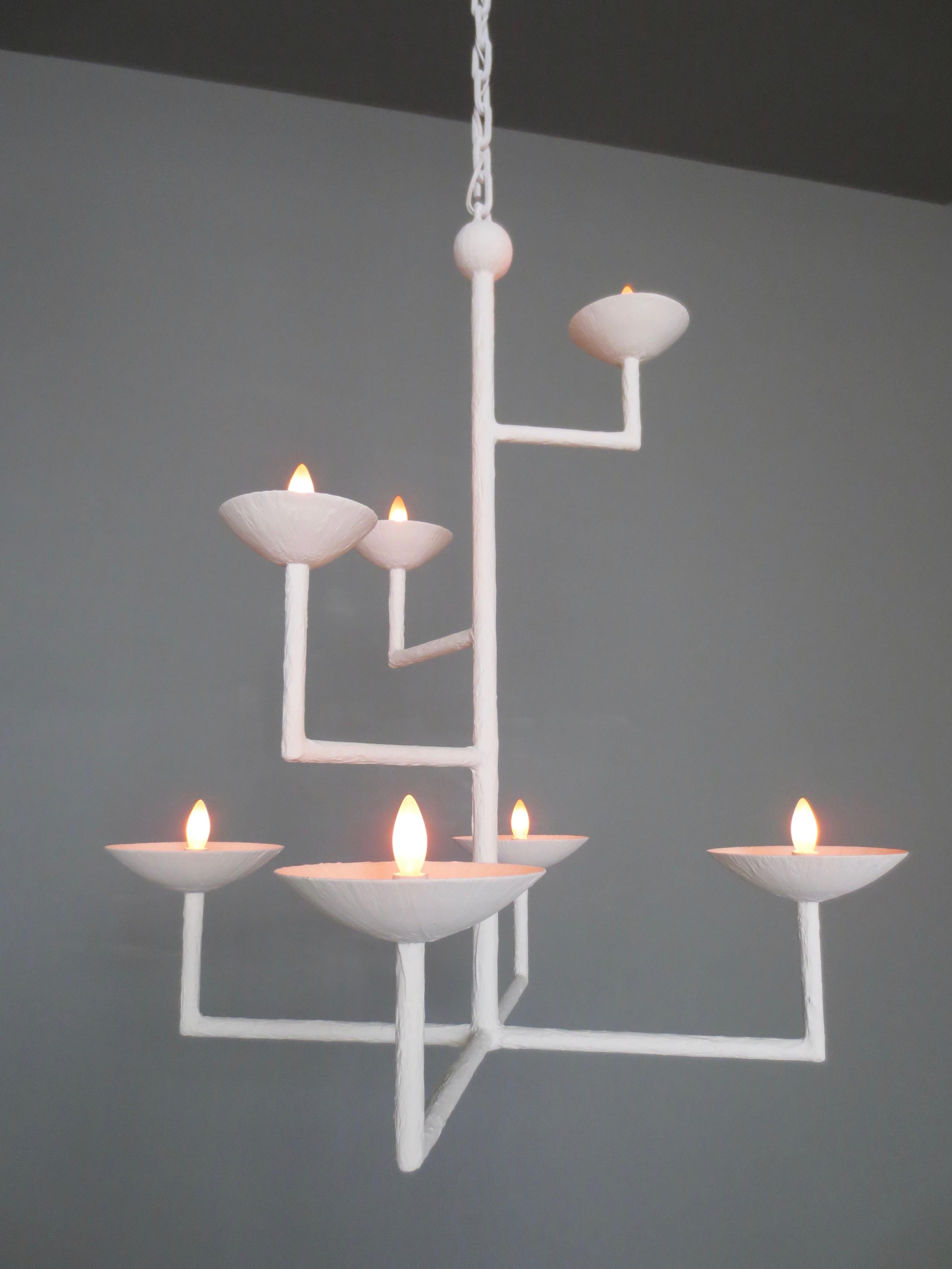 7 Cup Square Plaster Chandelier with Ball and Chain by Tracey Garet of Apsara Interior Design.
The 7 Cups of this chandelier are on various levels and the piece shown is a white plaster.  Each cup contains 1 individual light.  The fabrication is