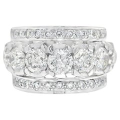 7 Diamonds Sandwiched by 2-Row Diamond Ring