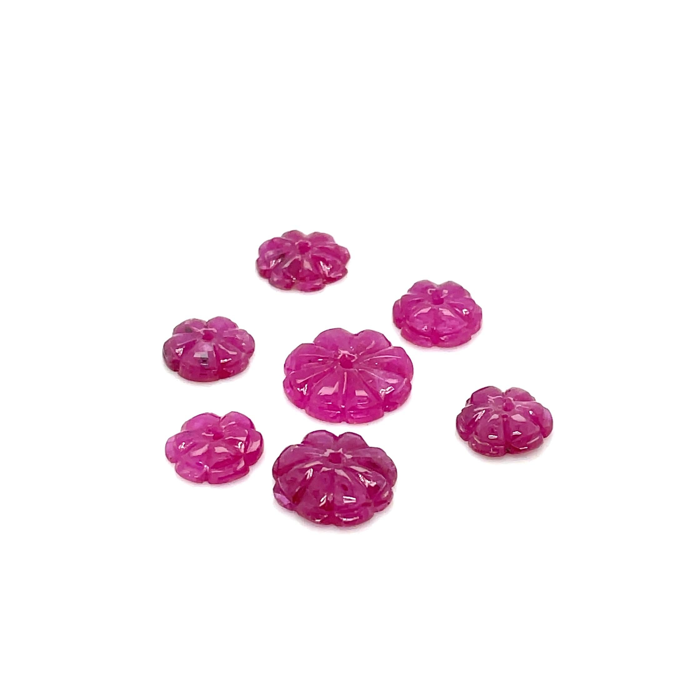 Featuring 7 exquisite ruby flower carvings (15.23 cts, no heat).

Sourced from Myanmar, these natural rubies radiate warmth and passion, symbolizing love, vitality, and strength.

With no heat treatment, these rubies retain their authentic charm,