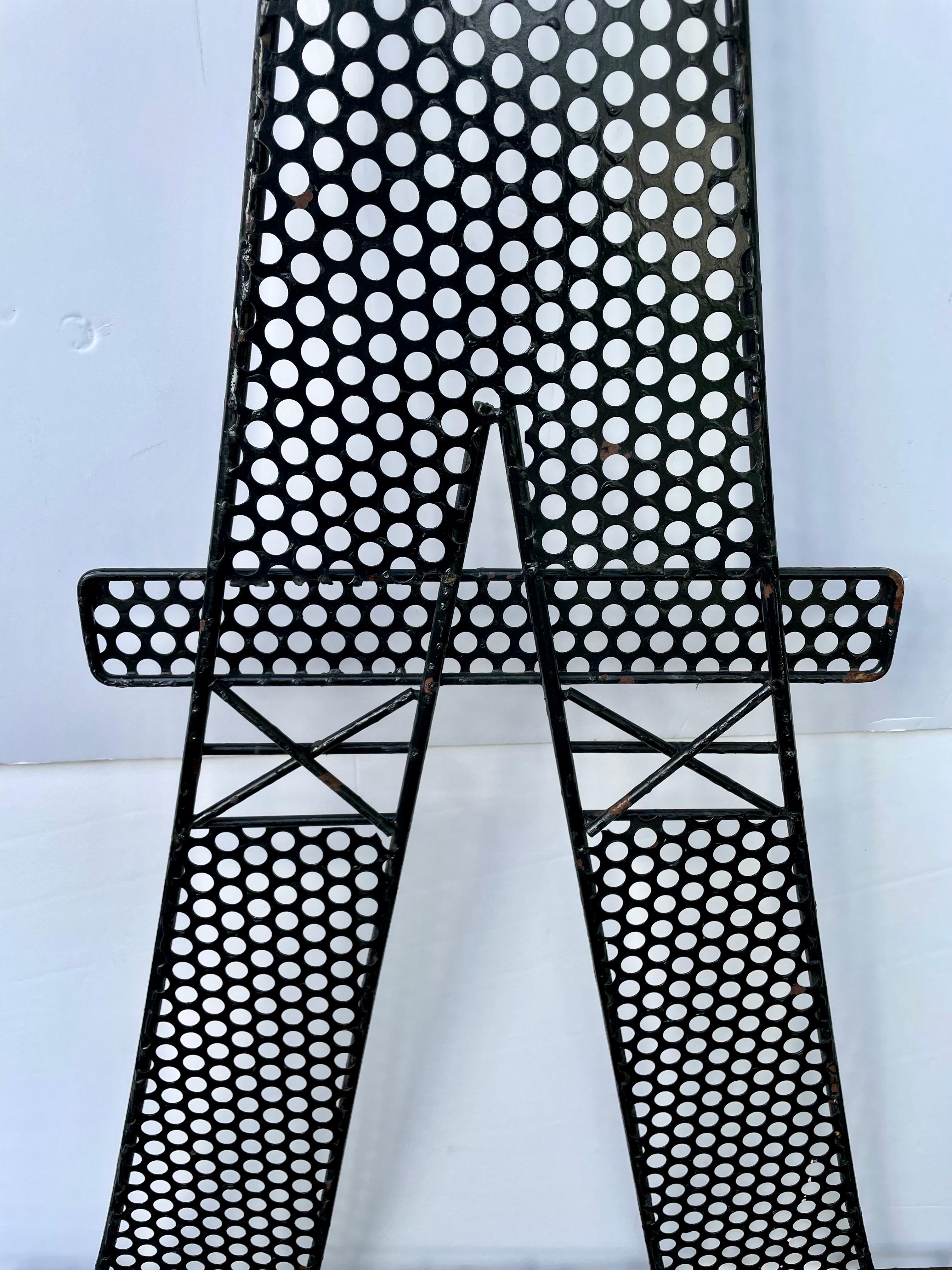 7 Foot Eiffel Tower Décor Piece used as Garden Trellis. One of a kind, Custom made for a Florida designer between the 1950s- 1970s. Was first used indoors in a Paris themed Great Room and them moved out to the garden in the 1990s. It is made of
