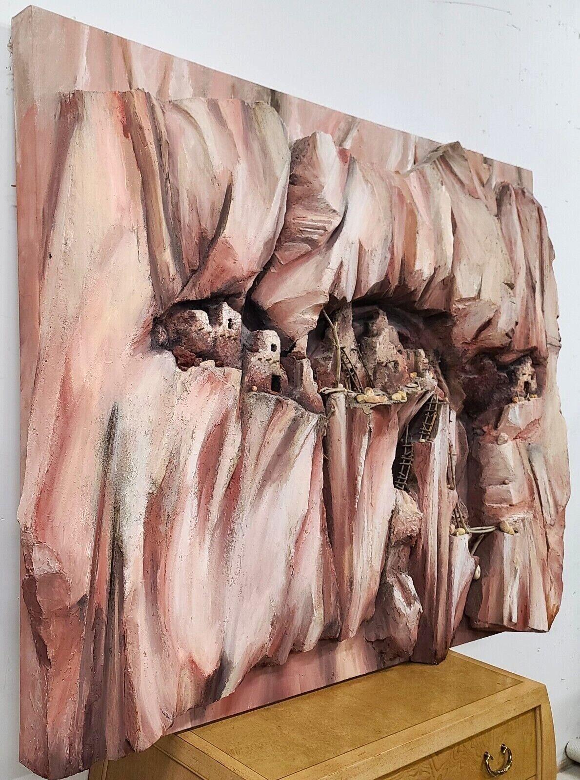 For FULL item description be sure to click on CONTINUE READING at the bottom of this listing.

7 Foot monumental Pueblo cliff dwelling 3 dimensional wall art sculpture 
Attributed to Artist Don Moore
Mounted on a wood frame and easily