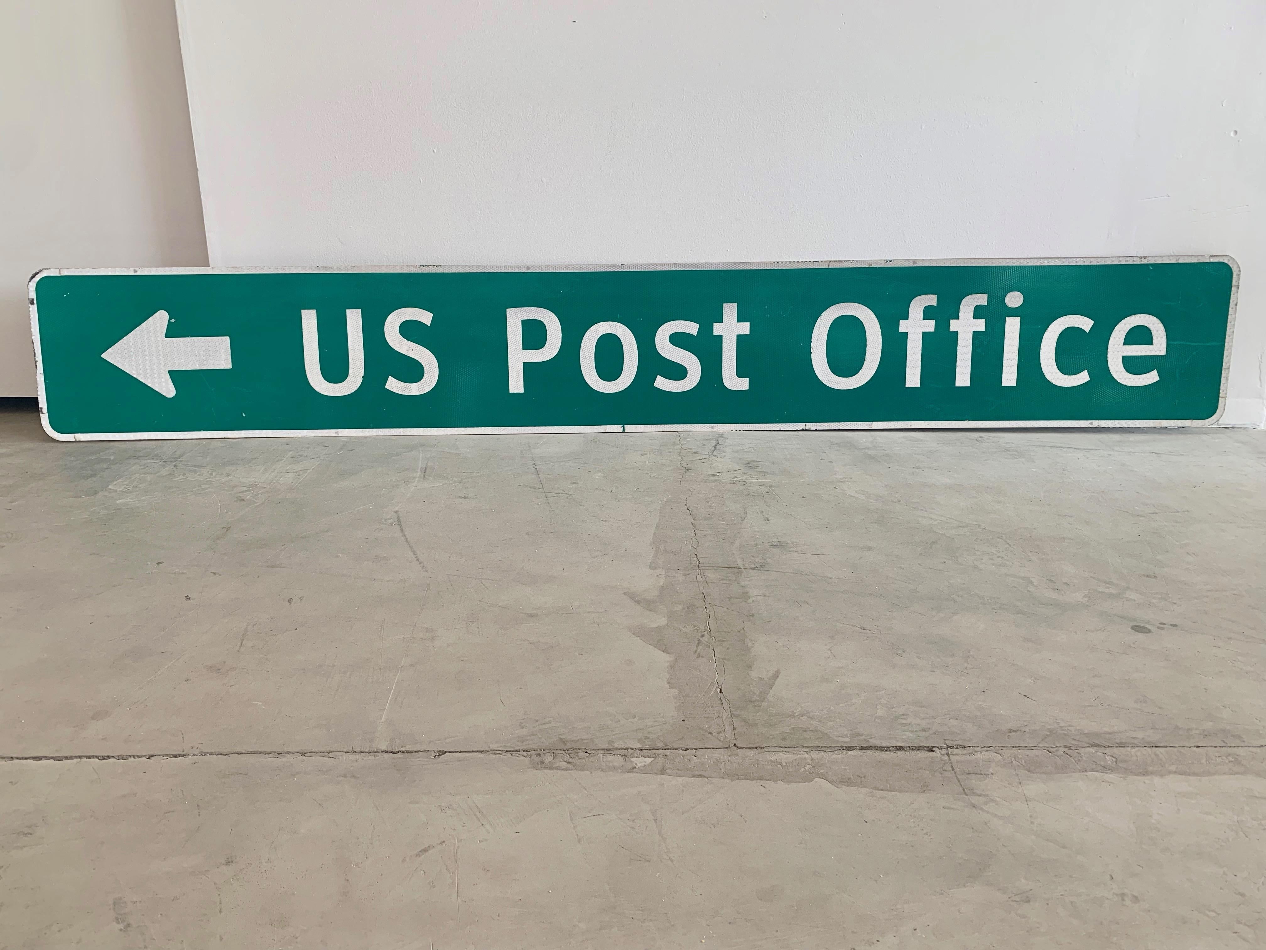 Massive US Post Office Highway sign from the south. Steel sign with reflective lettering. Great coloring and graphics. Good vintage condition. Measure: 7 foot.