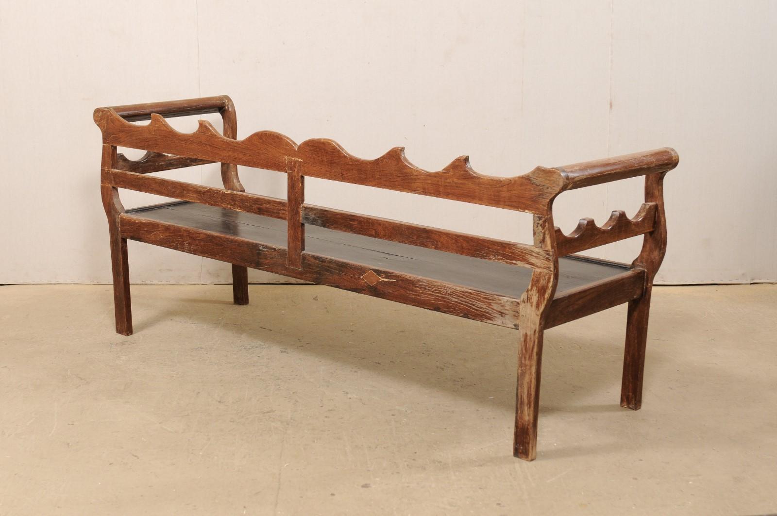 7 Ft Long Mid 20th C. Brazilian Peroba Wood Bench with Nicely Carved Back Rail 1