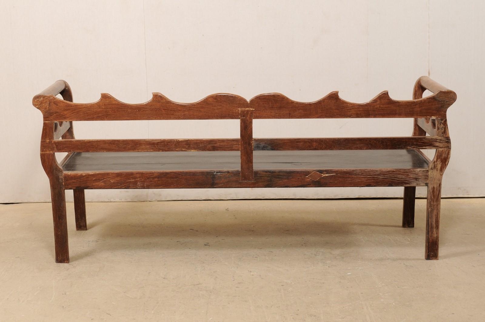 7 Ft Long Mid 20th C. Brazilian Peroba Wood Bench with Nicely Carved Back Rail 2