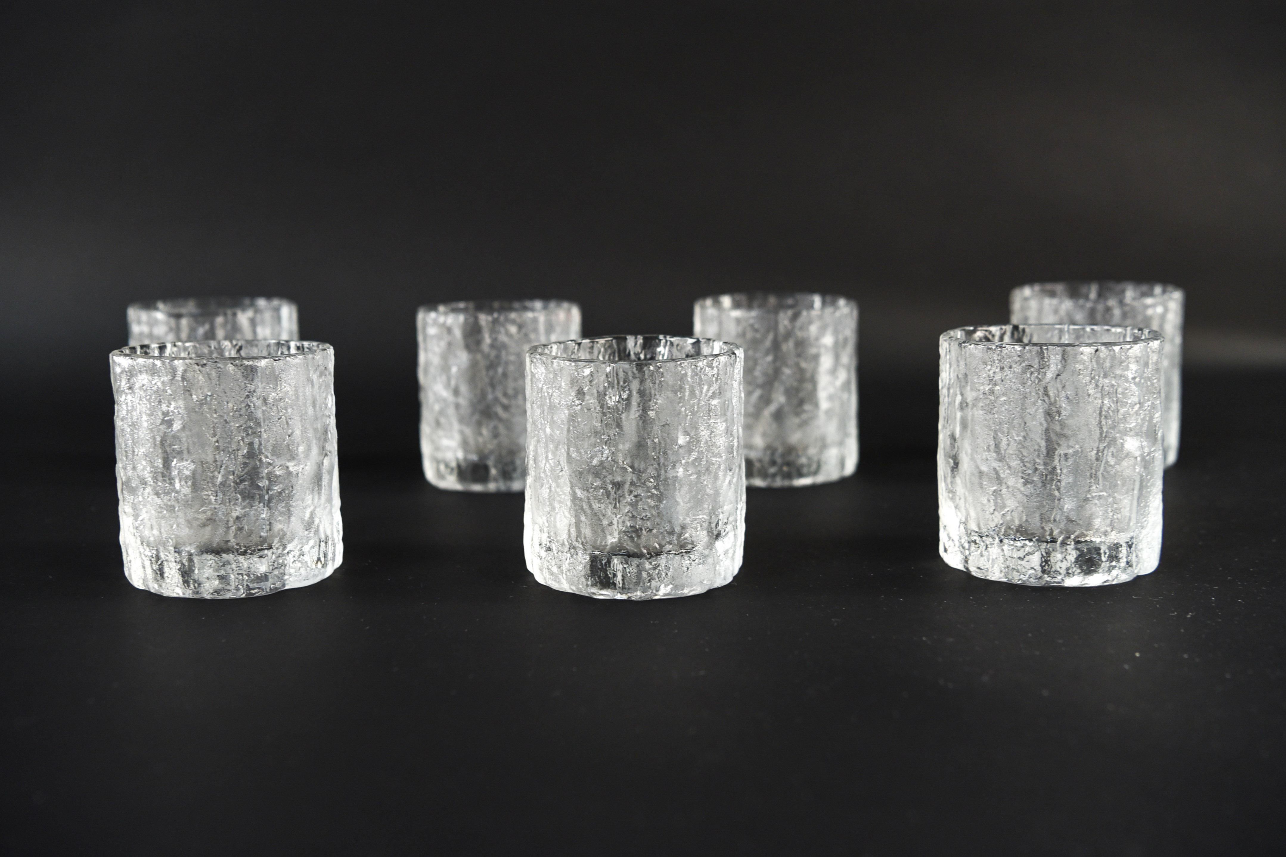 Drink in style with these Scandinavian ice glass midcentury cups. A wonderful example of ice glass work in a fun set for entertaining.