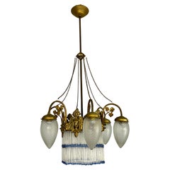 Lampadario Art Deco a 7 luci in ottone e vetro a sei bracci con frange colorate del 1940