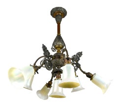 7-Light Chandelier with Quezal Shades and Gargoyle Design