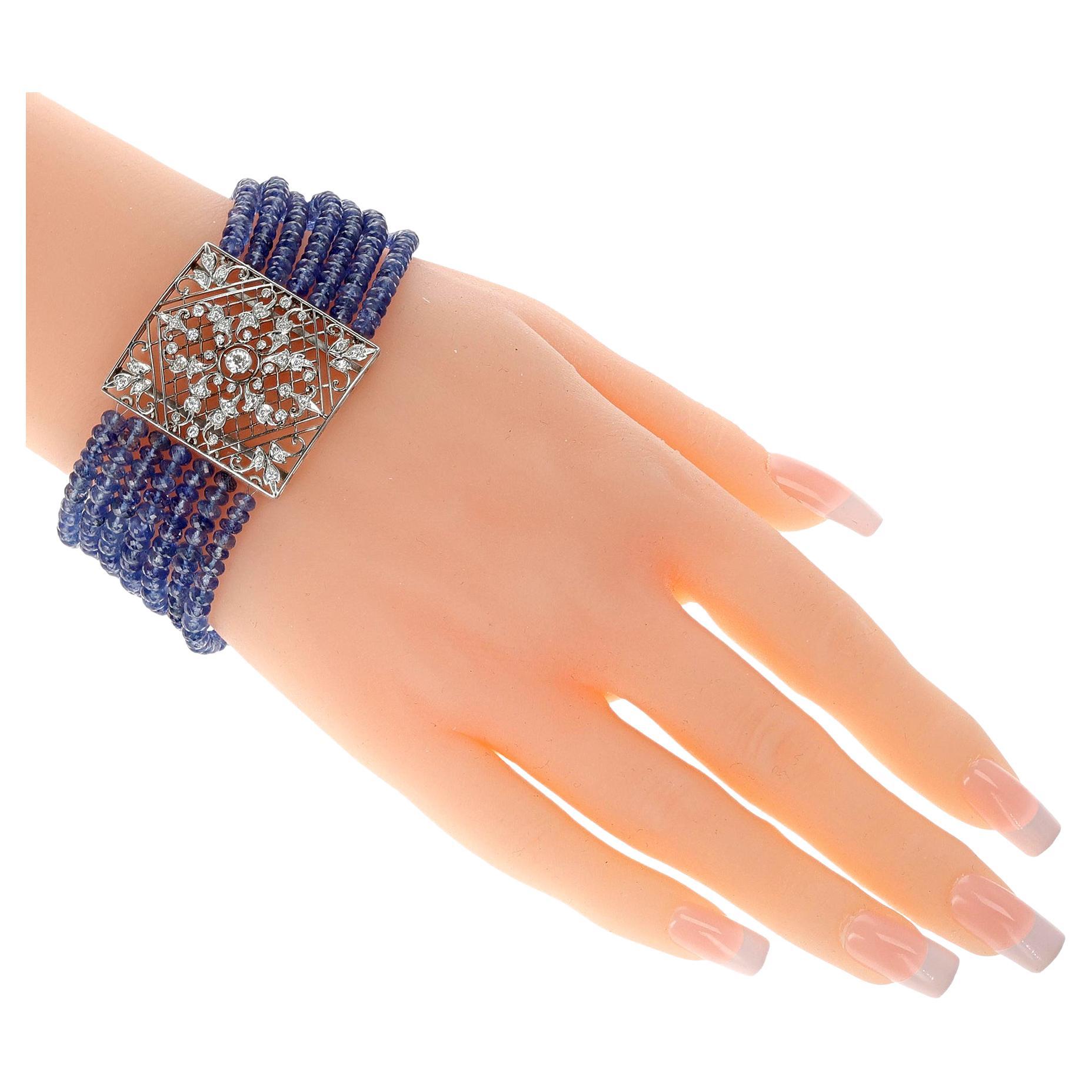 A 7 Line Sapphire Beads Bracelet with Diamond Clasp and Spacer. The total weight of the bracelet is 52.40 grams. The length is 7 inches.