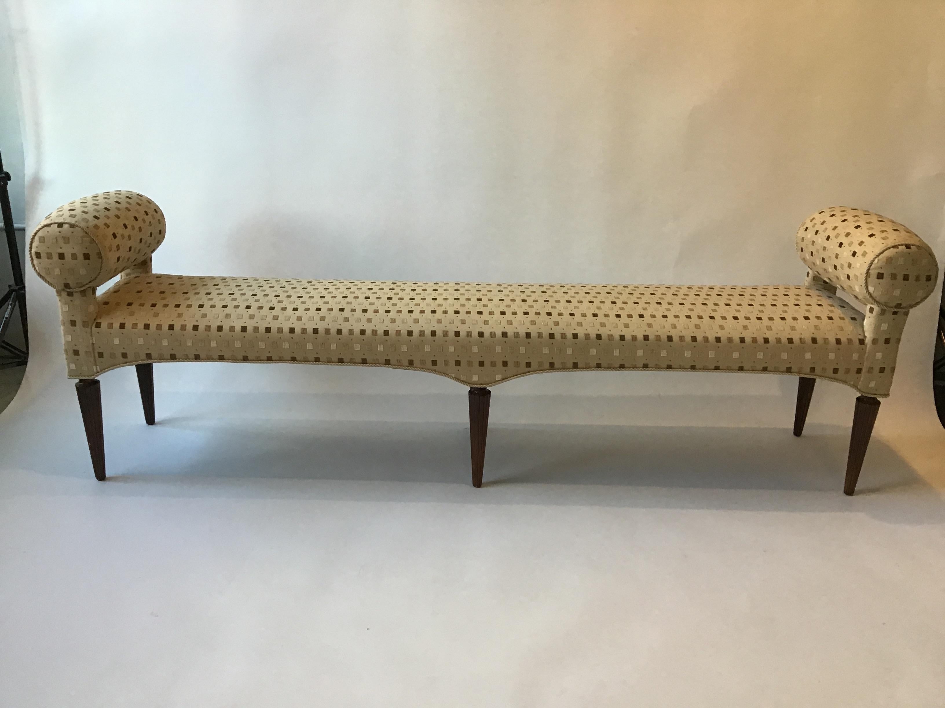 Almost 7’ long (81”), upholstered rolled arm bench.