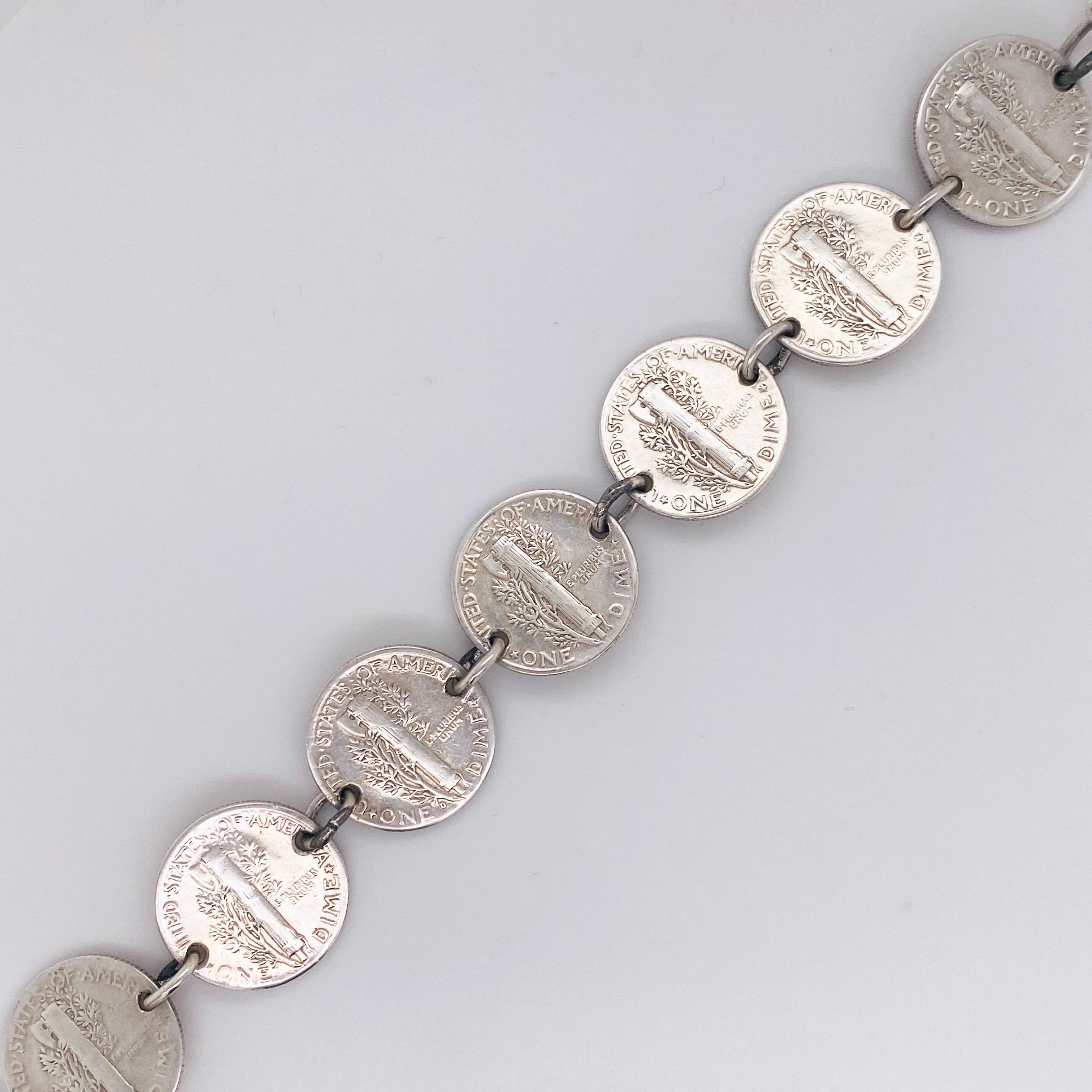 This sterling bracelet is one of a kind! It is made of seven mercury dimes that are held together by sterling silver jump rings. The bracelet has a sterling silver toggle clasp that is easy for putting on and off. This bracelet was designed for a