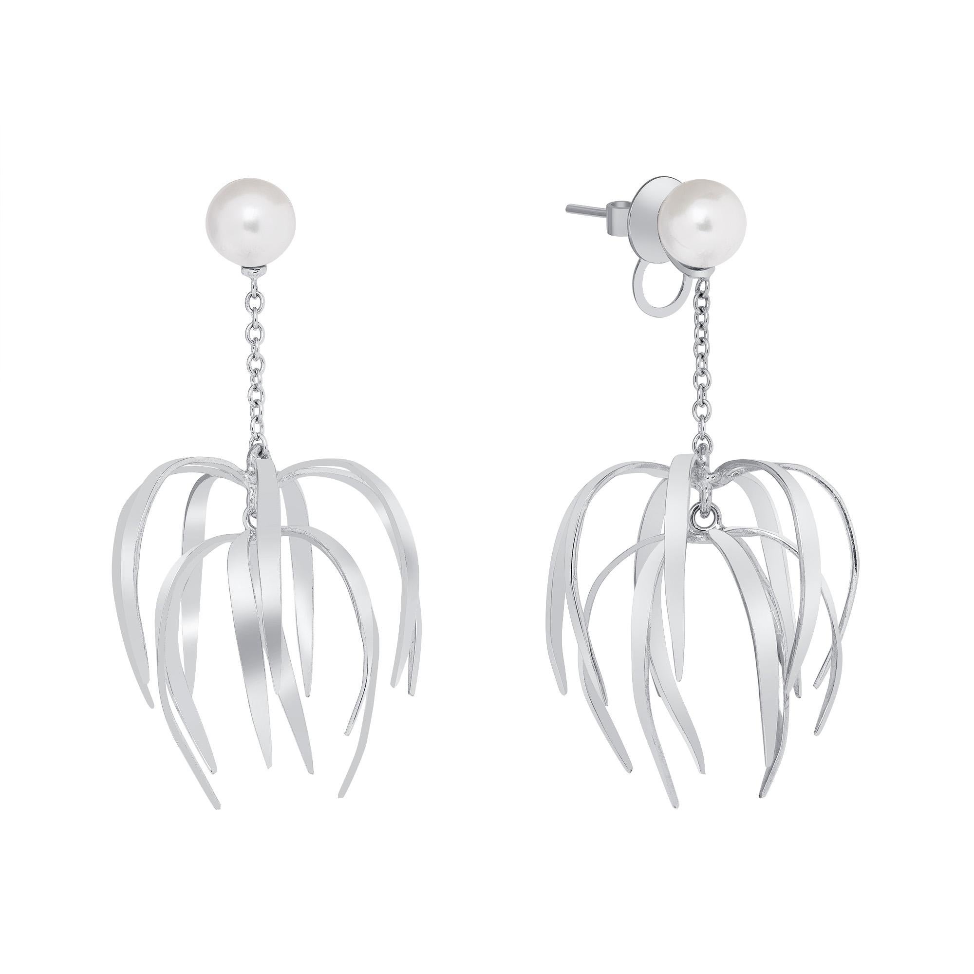7 Millimeter Matching South Sea Pearl White Gold Chandelier Earrings. These 18-karat white gold chandelier earrings feature two identical 7-millimeter South Sea Pearls. They are handcrafted in 18 karat white gold with large ear nuts for stability.