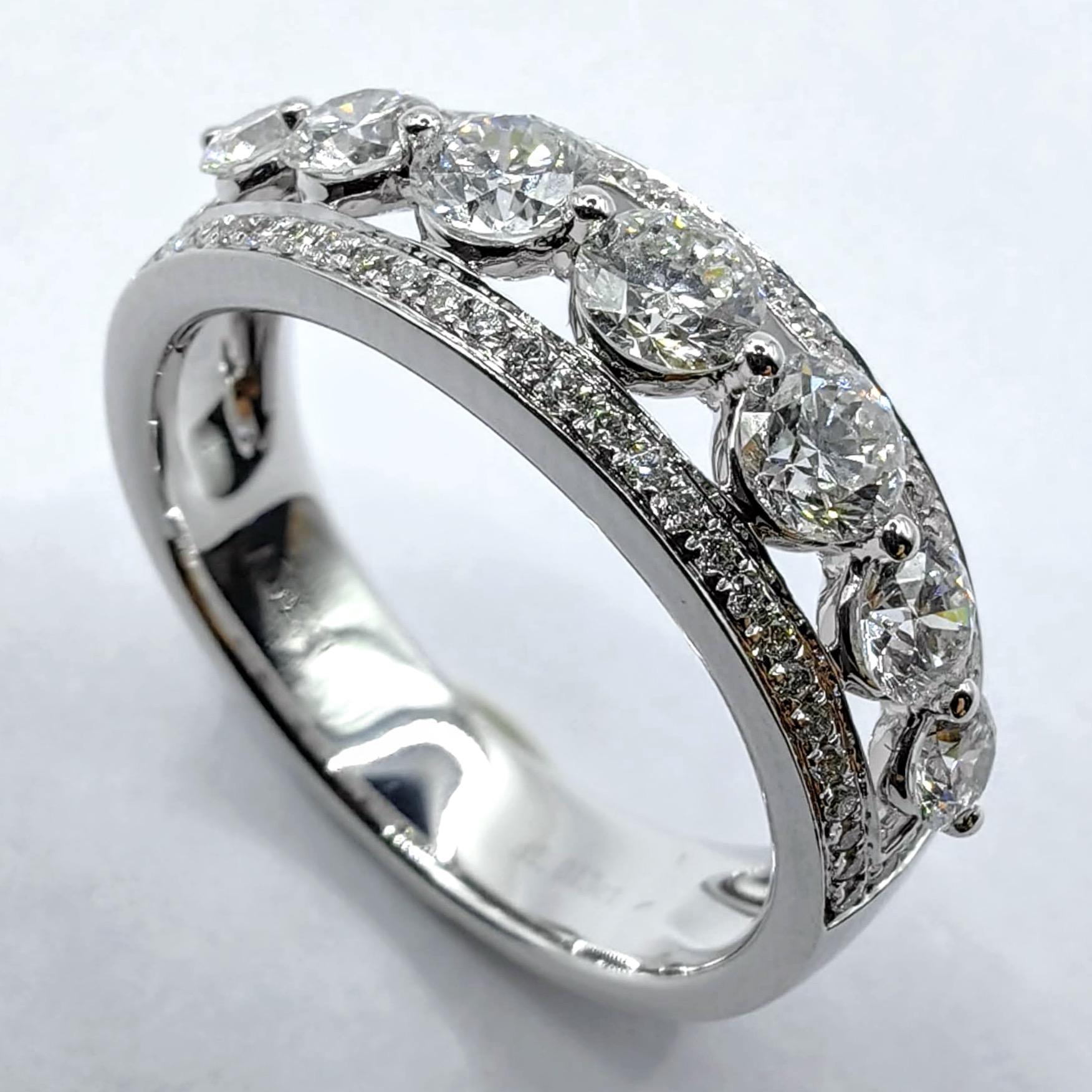 For Sale:  7 Round Brilliant Cut Diamonds & Pavé Diamond Channel Ring in 18K White Gold 2