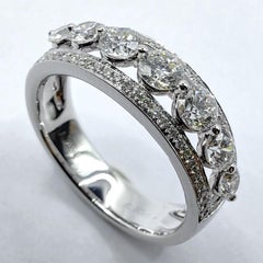 7 Round Brilliant Cut Diamonds & Pavé Diamond Channel Ring in 18K White Gold