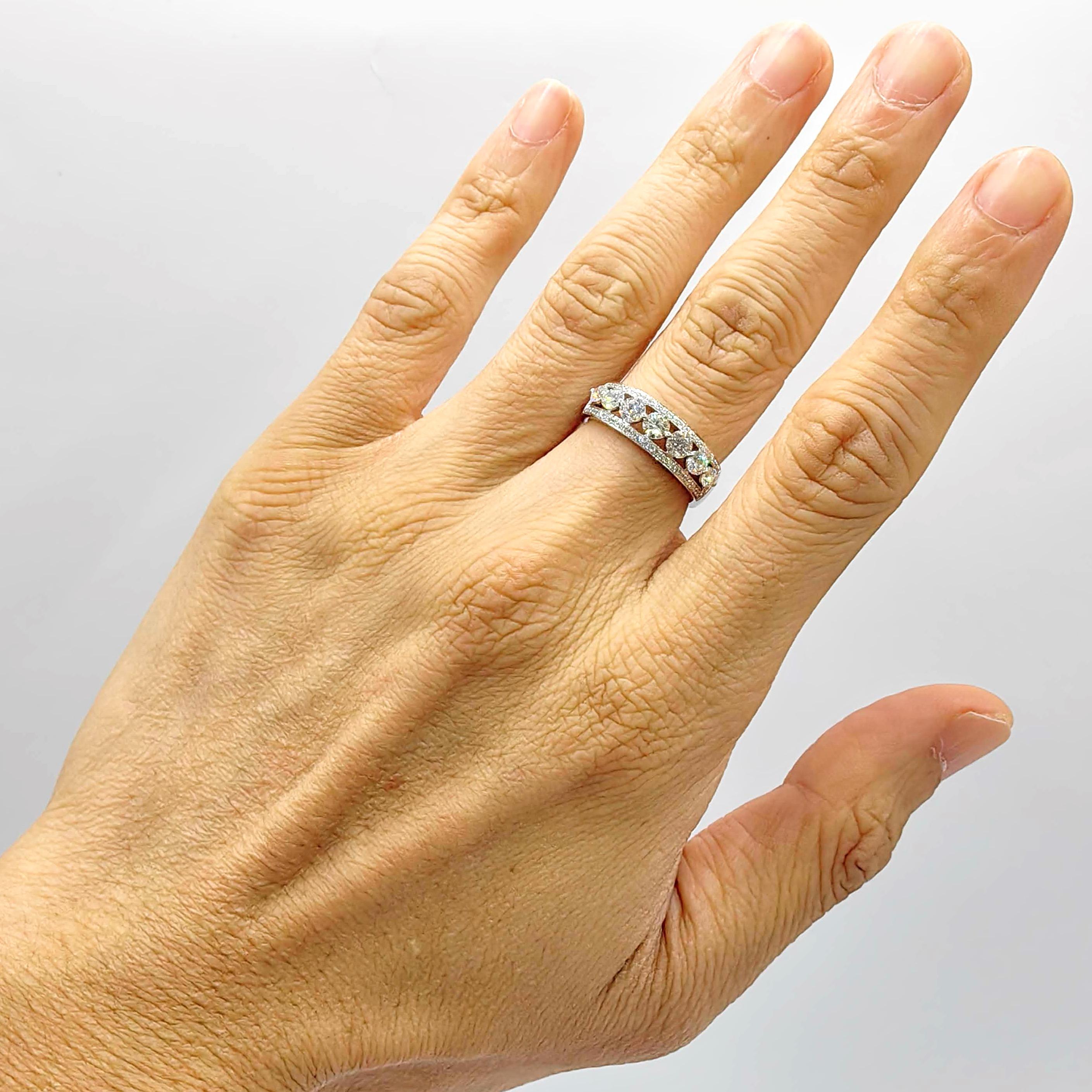 For Sale:  7 Round Brilliant Cut Diamonds & Pavé Diamond Channel Ring in 18K White Gold 8