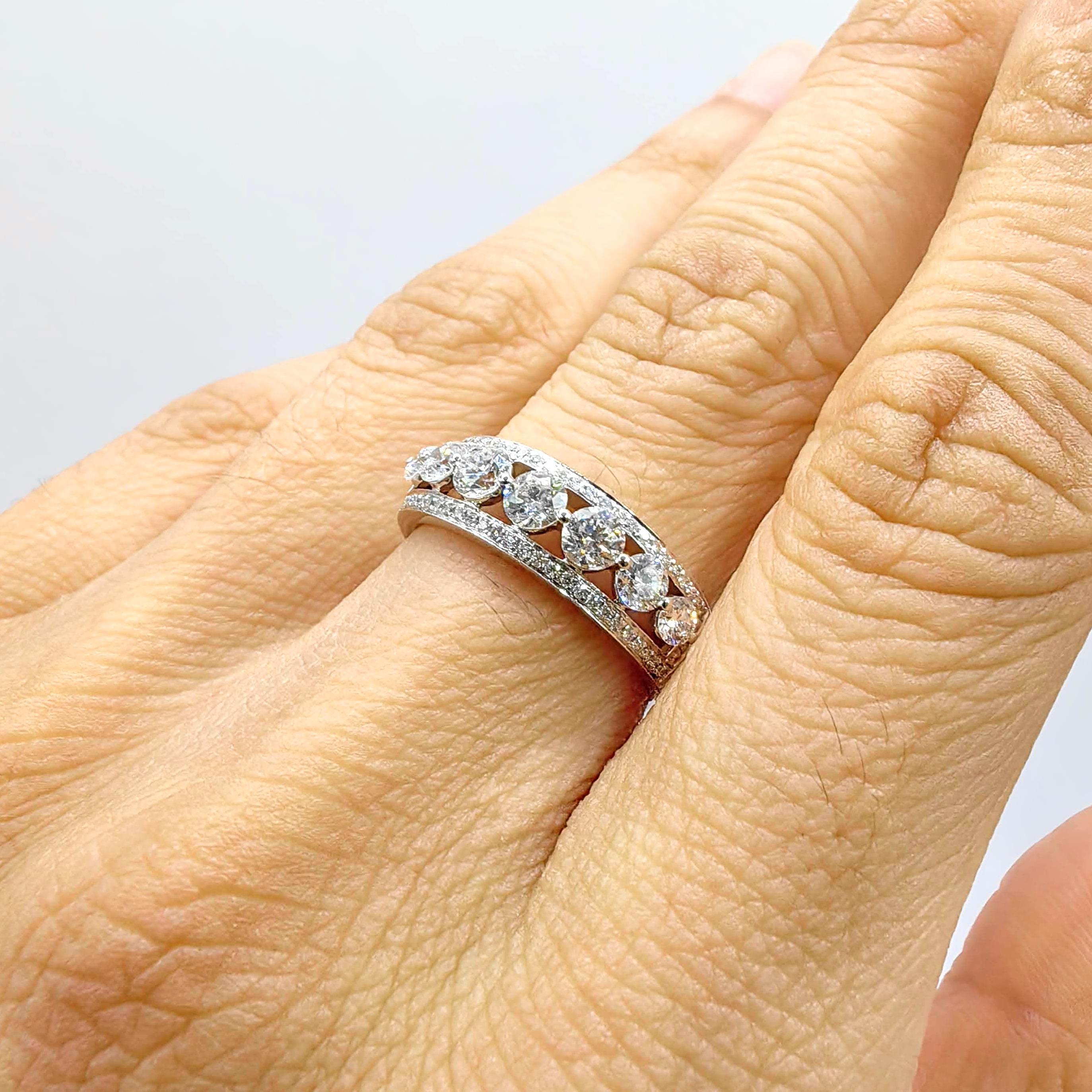 For Sale:  7 Round Brilliant Cut Diamonds & Pavé Diamond Channel Ring in 18K White Gold 9