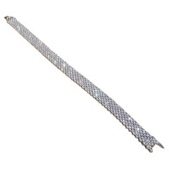 Bracciale a 7 file di diamanti naturali da 10,50 carati totali in oro bianco 18k