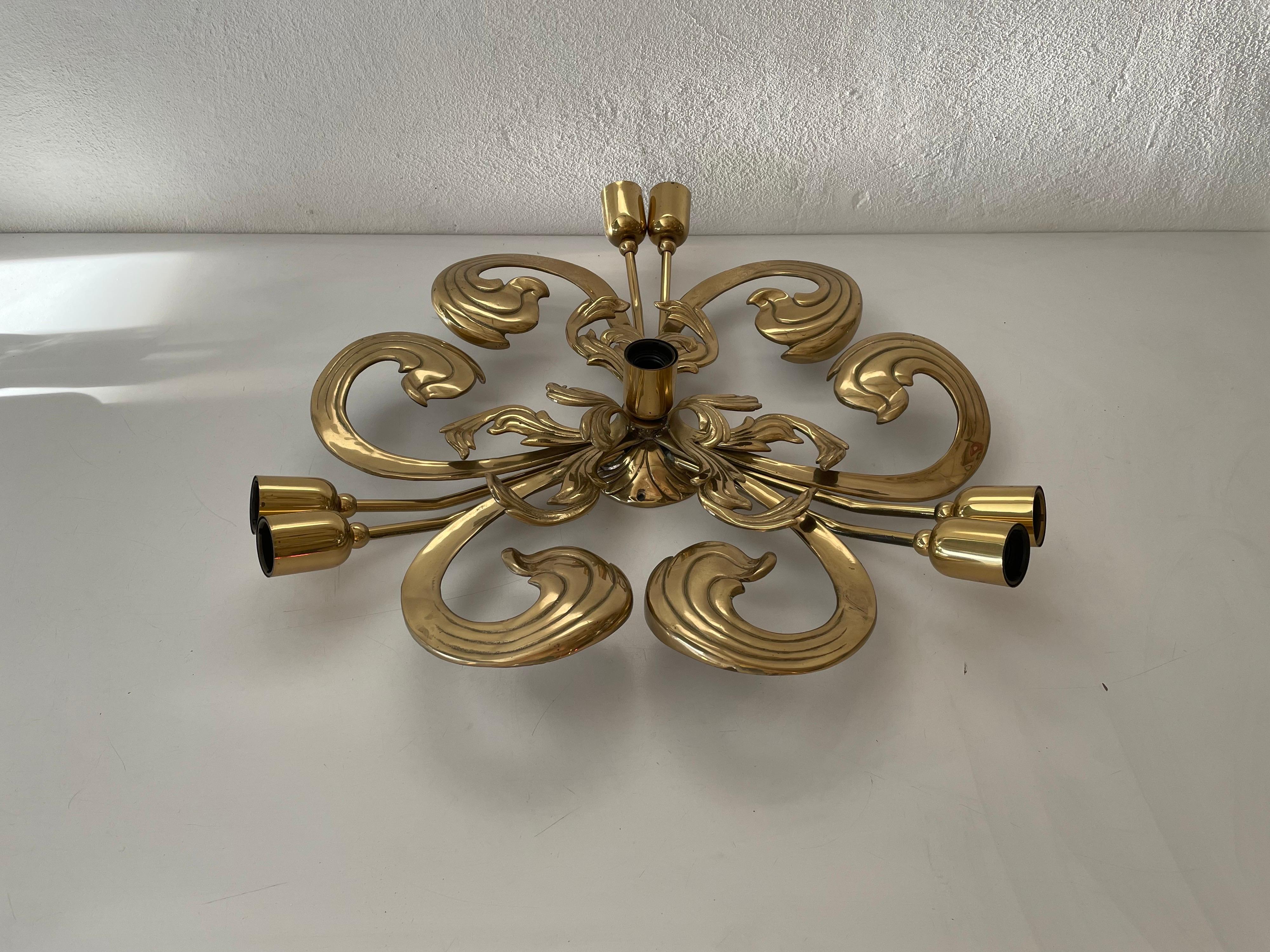 Wonderful 7 socket flower shaped full brass XL chandelier by Hans Möller, 1960s, Germany

Sculptural very elegant rare heavy ceiling lamp. 

It is very ideal and suitable for all living areas.

Lamp is in good condition. No damage, no