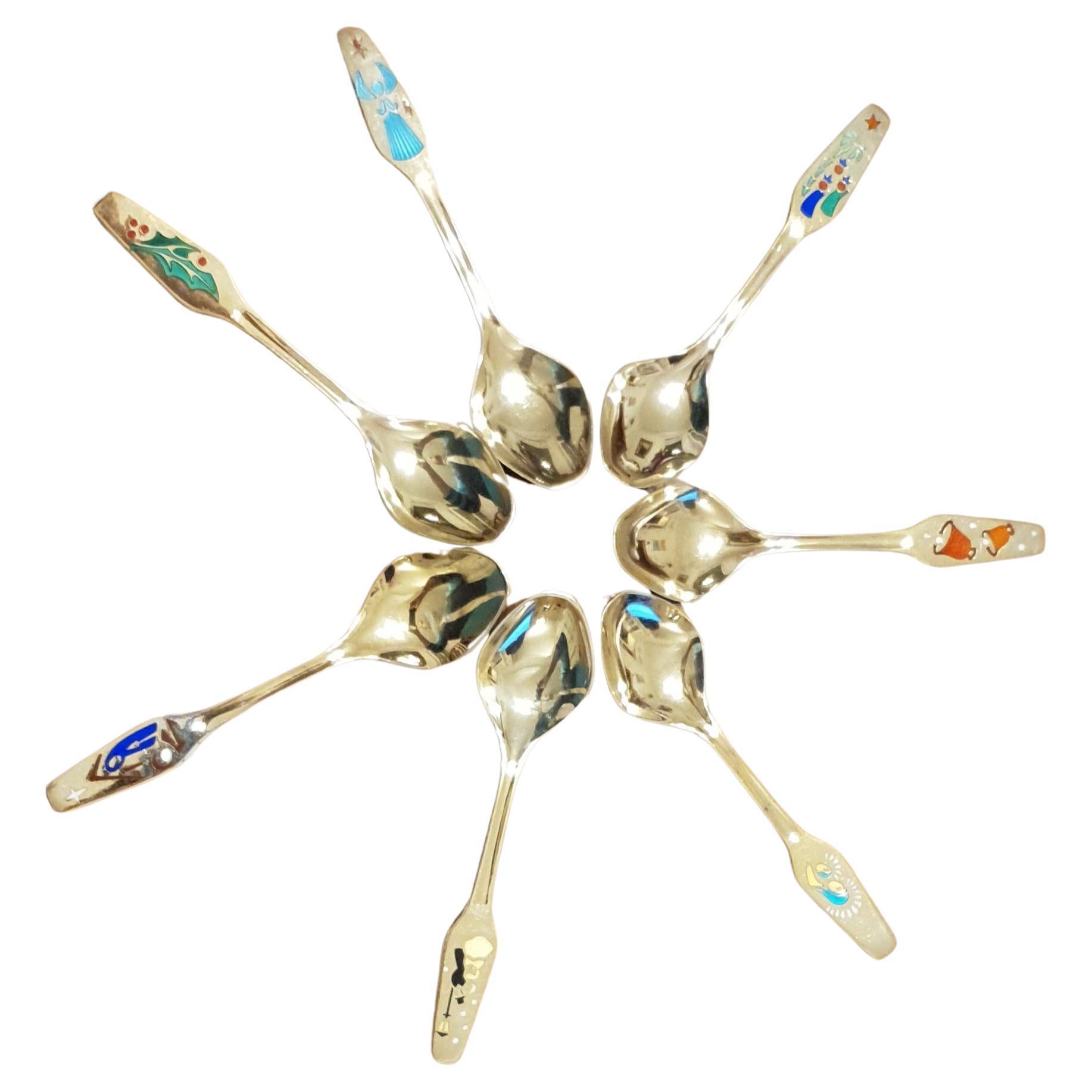 7 sterling silver and enamel christmas spoons by Meka, Denmark