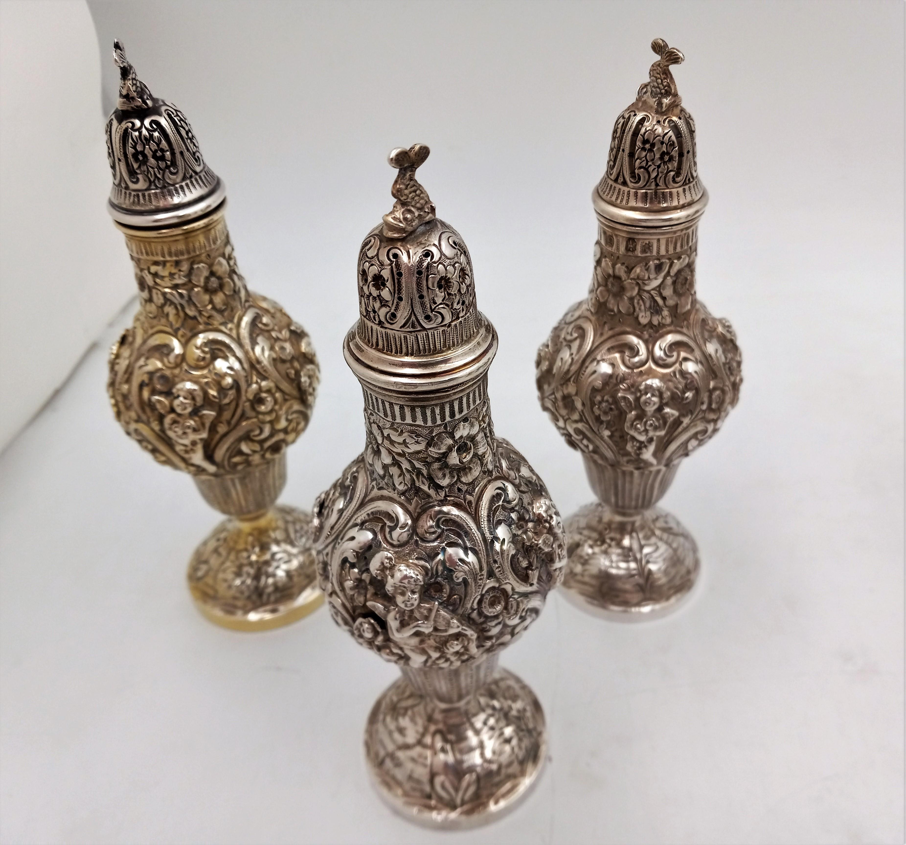 Sterling silver hand chased cherub repousse Master Shakers with European hallmark -- Set of 7. Height: 8