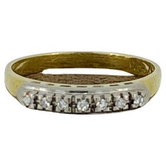 Bracelet artisanal de style « Dearest » à 7 pierres en or jaune 18 carats et platine.