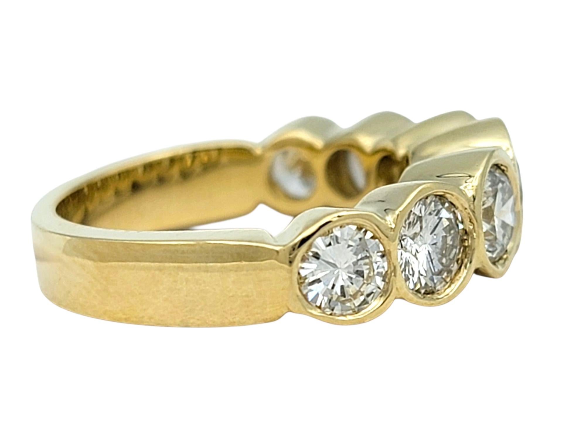 Contemporary 7 Stone Round Cut Bezel Set Diamond Band Ring in Polished 14 Karat Yellow Gold For Sale