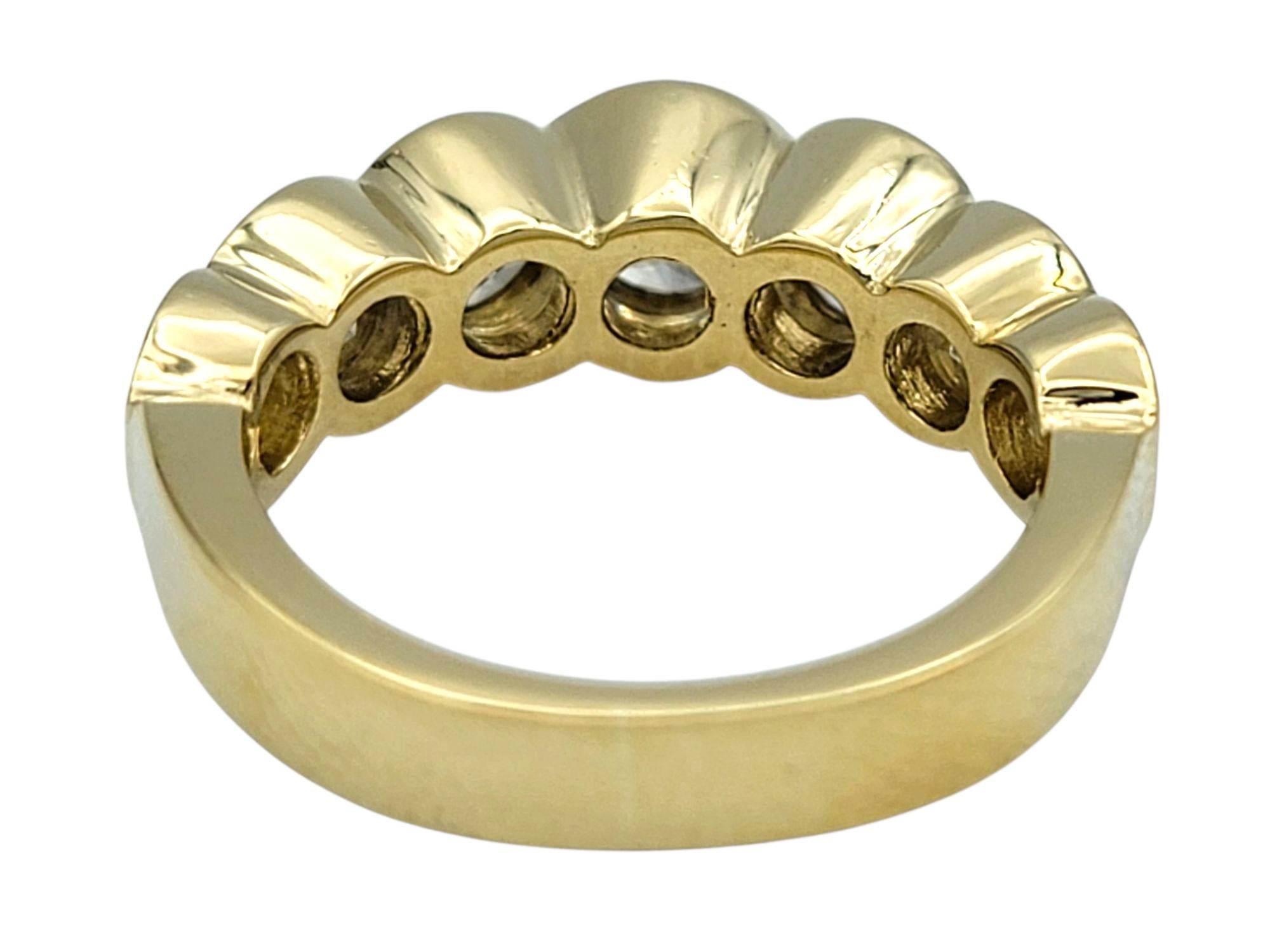 Women's 7 Stone Round Cut Bezel Set Diamond Band Ring in Polished 14 Karat Yellow Gold For Sale