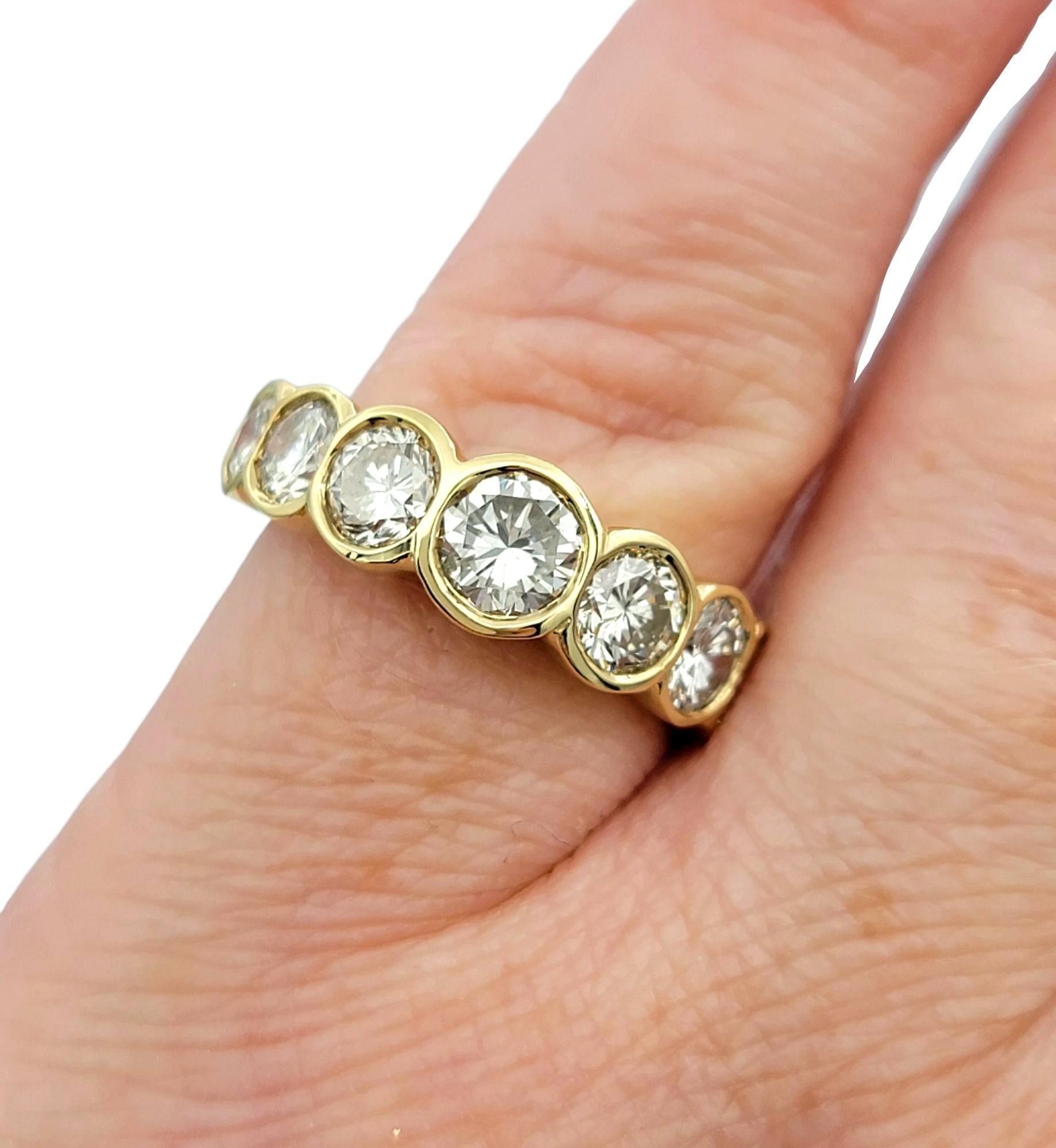 7 Stone Round Cut Bezel Set Diamond Band Ring in Polished 14 Karat Yellow Gold For Sale 2