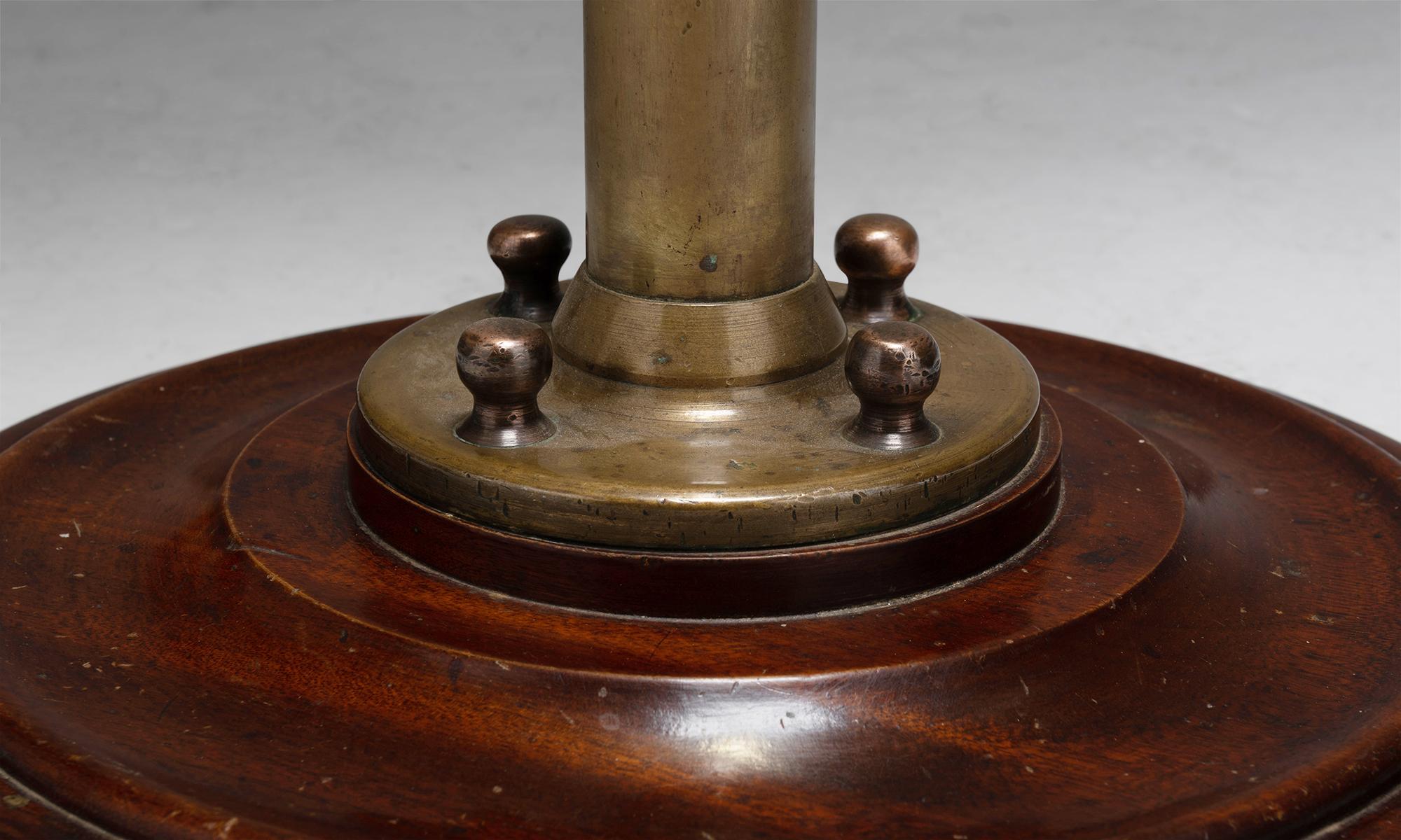 7 ' tall brass standing lamp

England Circa 1900

On carved mahogany base, with new linen shade and diffuser.

Measures: 24”W x 20”D x 86”H (with shade).