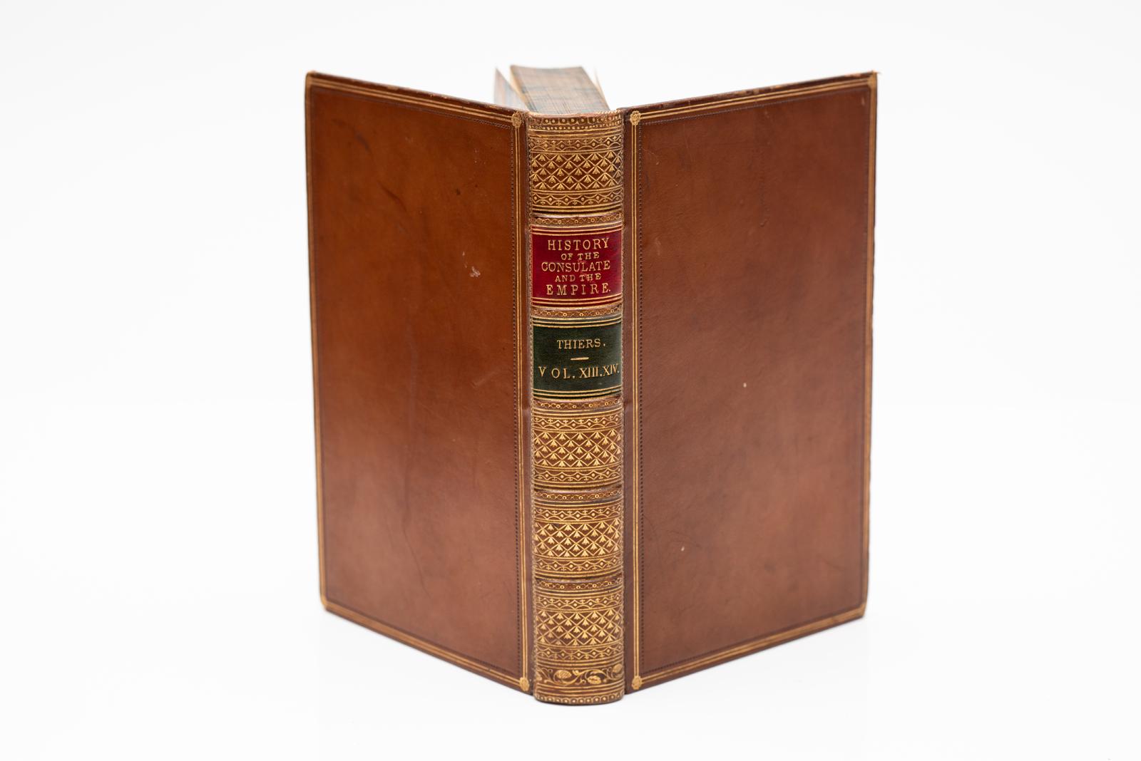 7 Volumes. M.A. Thiers. History Of The Consulate and The Empire Of France Under Napoleon. Bound in full tan calf, marbled edges and endpapers, raised bands, ornate gilt on spines, illustrated (14 Volumes bound into 7 Volumes).
Published: London:
