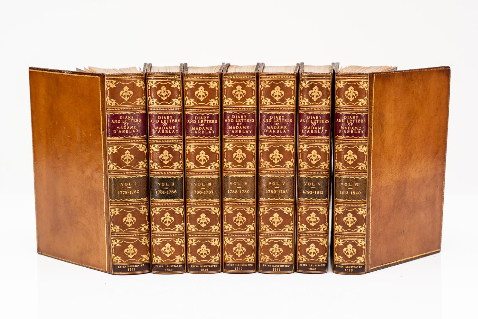 7 volúmenes. Madame D'Arblay. Diario y Cartas. Editado por su sobrina. Encuadernado en plena piel de becerro, bordes superiores dorados, bandas en relieve, paneles dorados, guardas jaspeadas. Extra Ilustrado con 4 láminas coloreadas a mano.