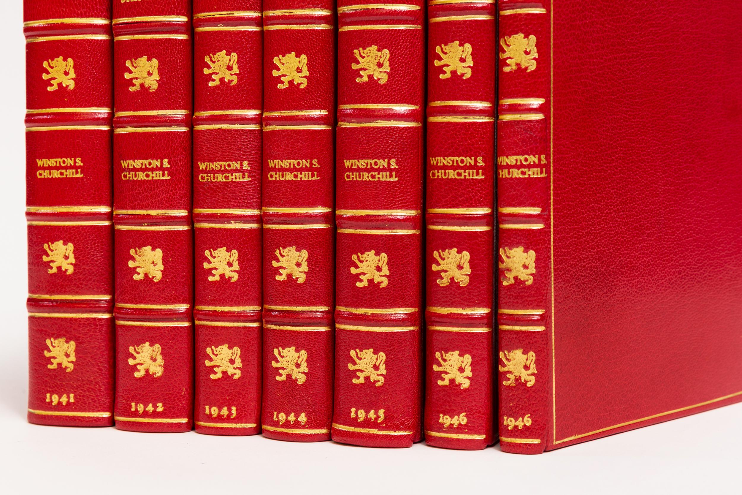 7 Volumes. Winston S. Churchill, The War Speeches.Bound in full red morocco. Gilt tooling on covers. All edges gilt. Raised bands. Decorative gilt emblems on spine. Illustrated. Half-tone frontispiece. Includes War Speeches. First edition.