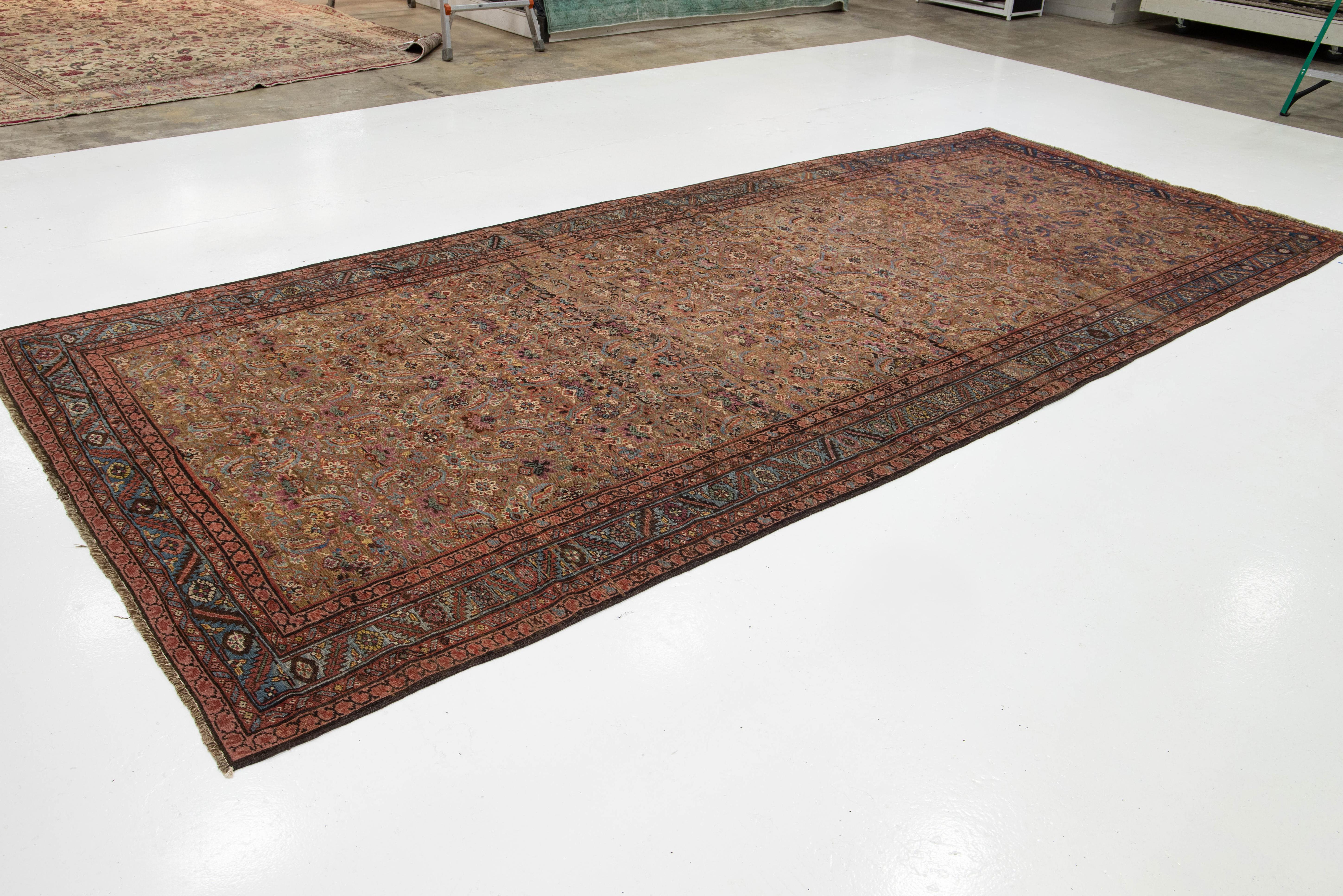 Hand-Knotted 7 x 15 Antique Bakshaeish Persian Wool Rug In Brown With Allover Floral Design For Sale