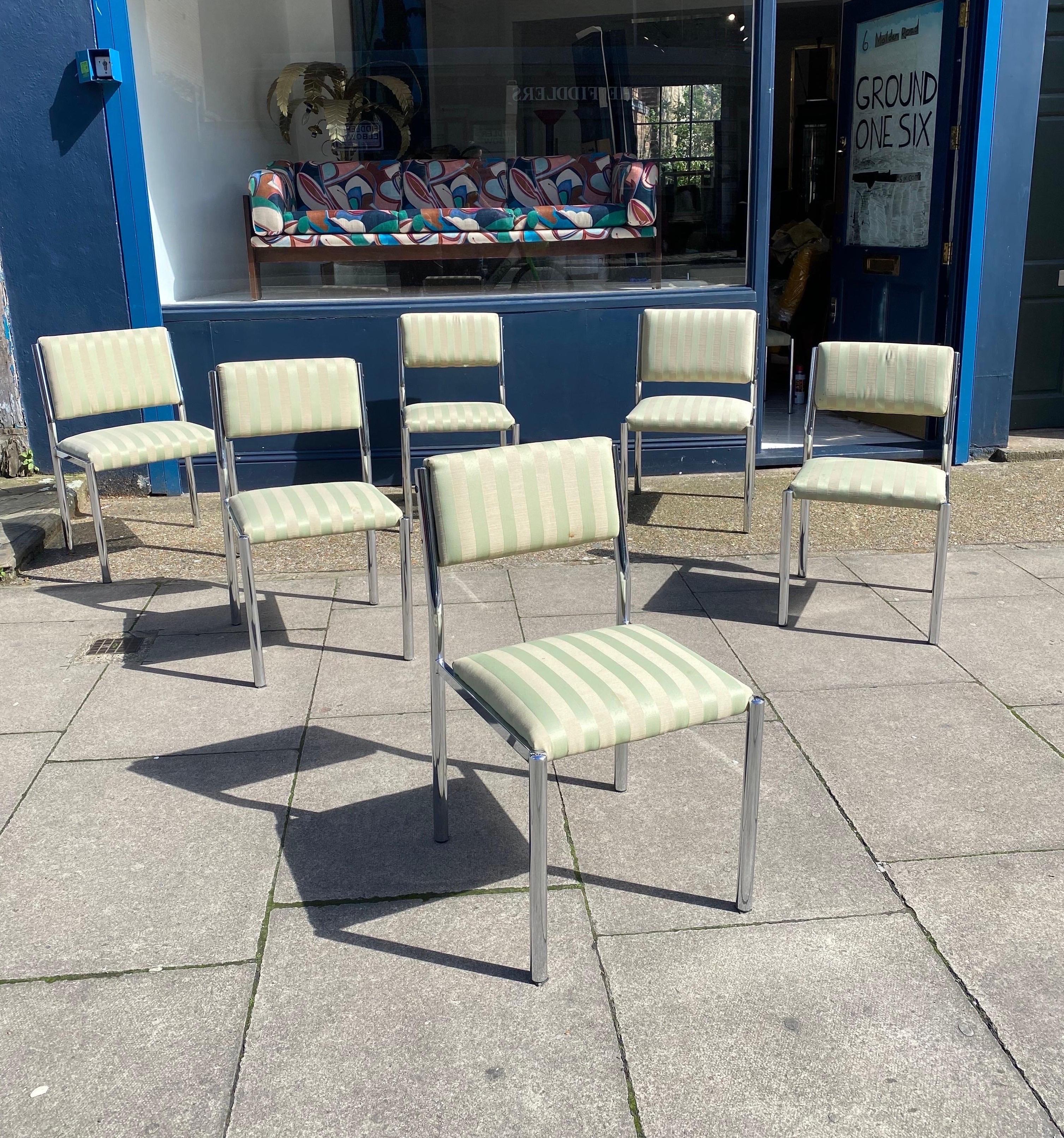 Italian chrome set of seven dining chairs in mint green satin cotton and chrome steel tubular frame. 
The back upholstery is covering both sides. 

Overall in good condition with some signs of wear but nothing serious. They are perfectly