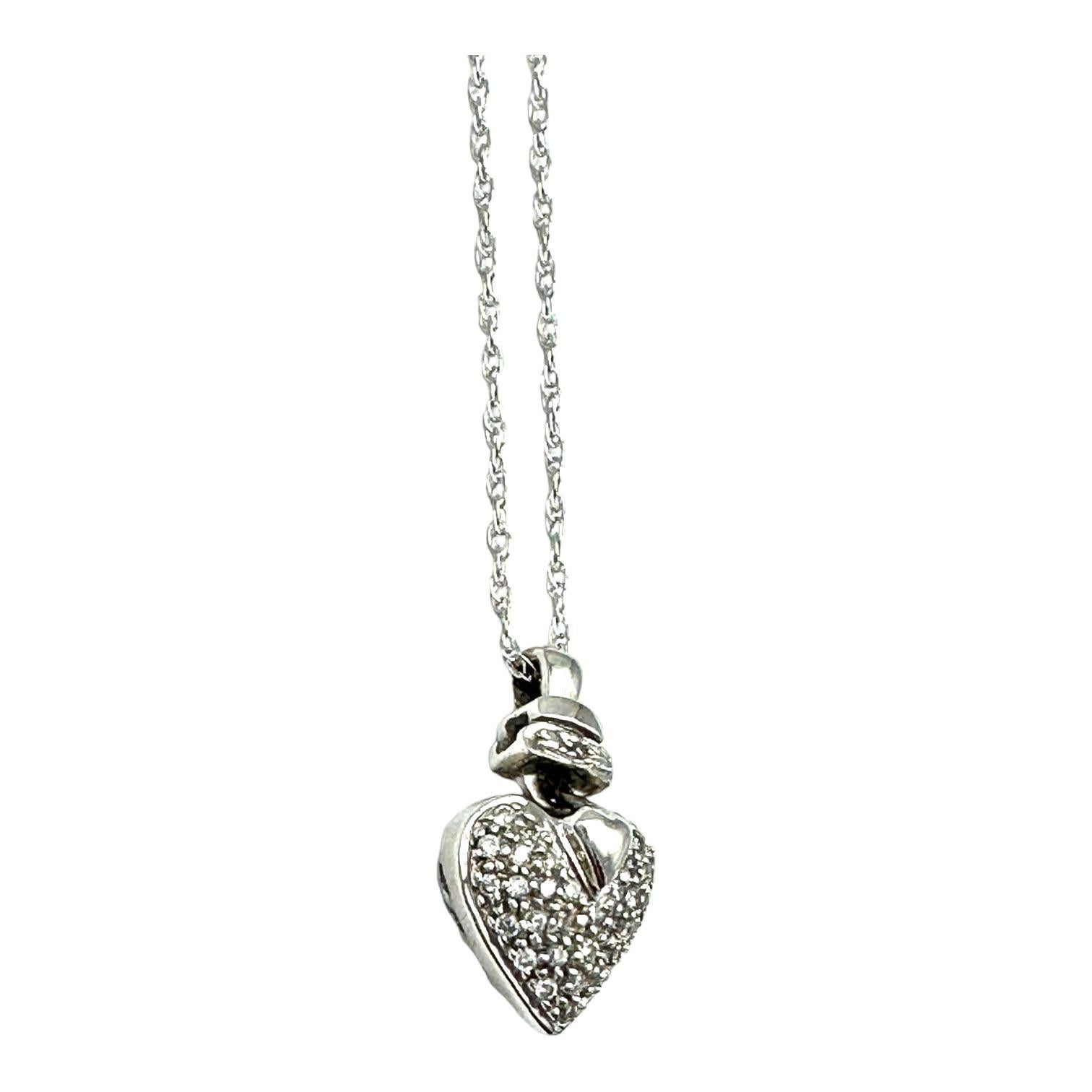 This 14Kt White Gold Pave Puff Diamond Heart Pendant is a classic piece that will make a great addition to any jewelry collection. The focal point of this pendant is the gorgeous puff diamond heart, crafted with expert detail and precision to create