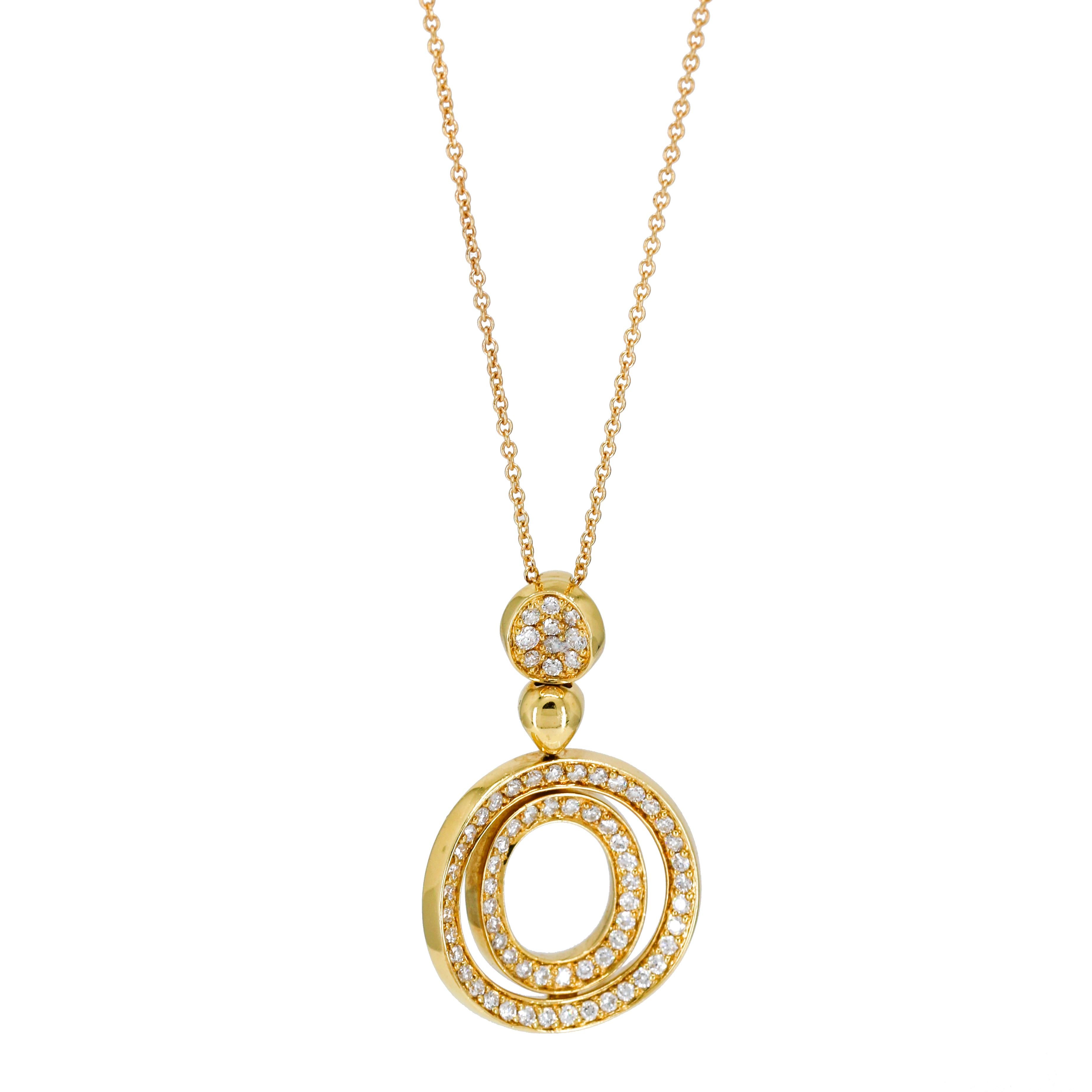 Round drop pendant necklace in 18-karat yellow gold with diamonds. 

Length, 18 inches 
Height, 31.5mm
Width, 19mm
Depth, 3mm
Weight, 8.5 grams
Diamond Total Carat Weight, .70 carat 

Previously owned, in excellent condition. Original packaging not