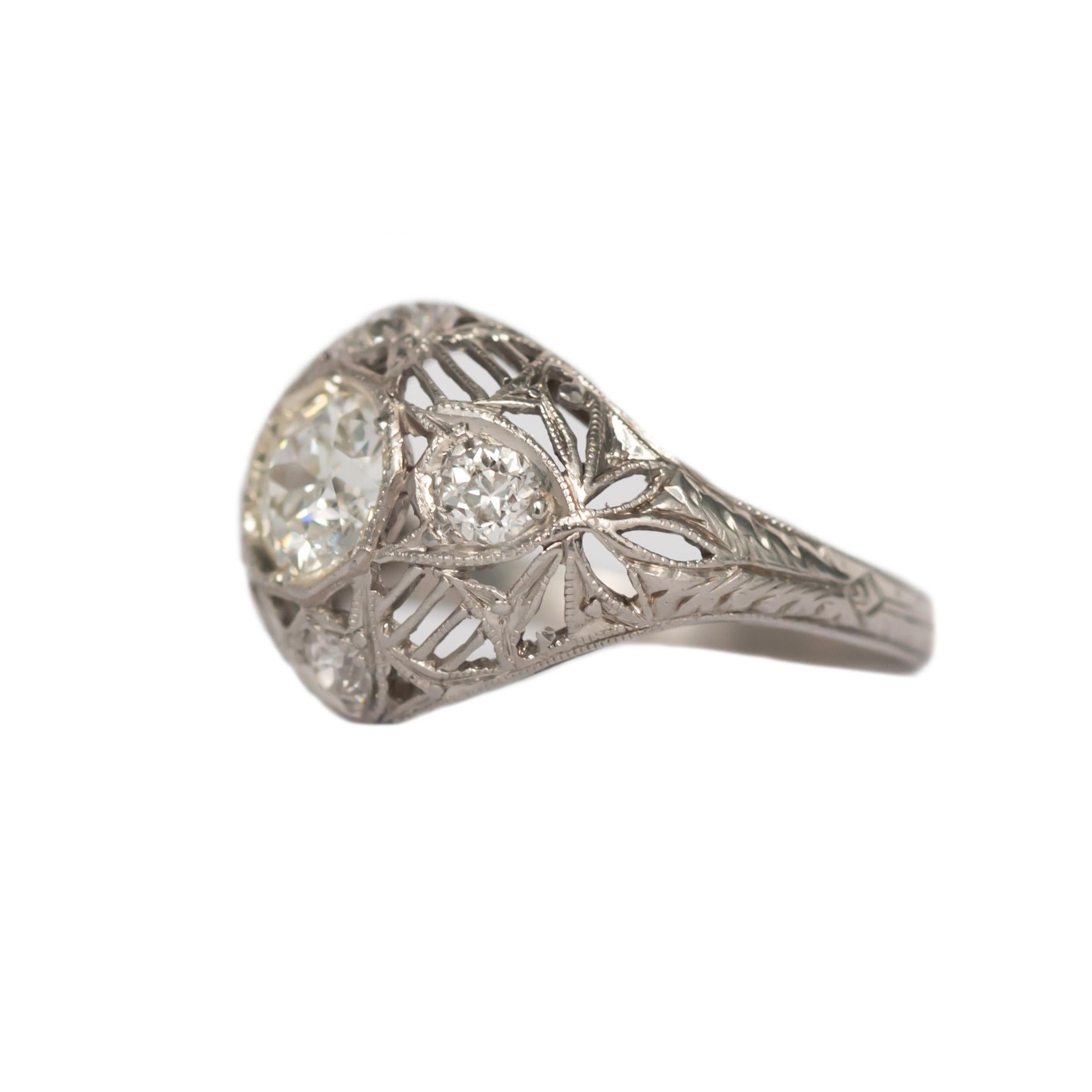 Item Details: 
Ring Size: 6.75
Metal Type: Platinum [Tested & Hallmarked]
Weight: 4.1 grams

Center Diamond Details
Shape: Old European Brilliant
Carat Weight: .70 carat
Color: H
Clarity: VS1

Side Stone Details: 
Shape: Old European 
Total Carat