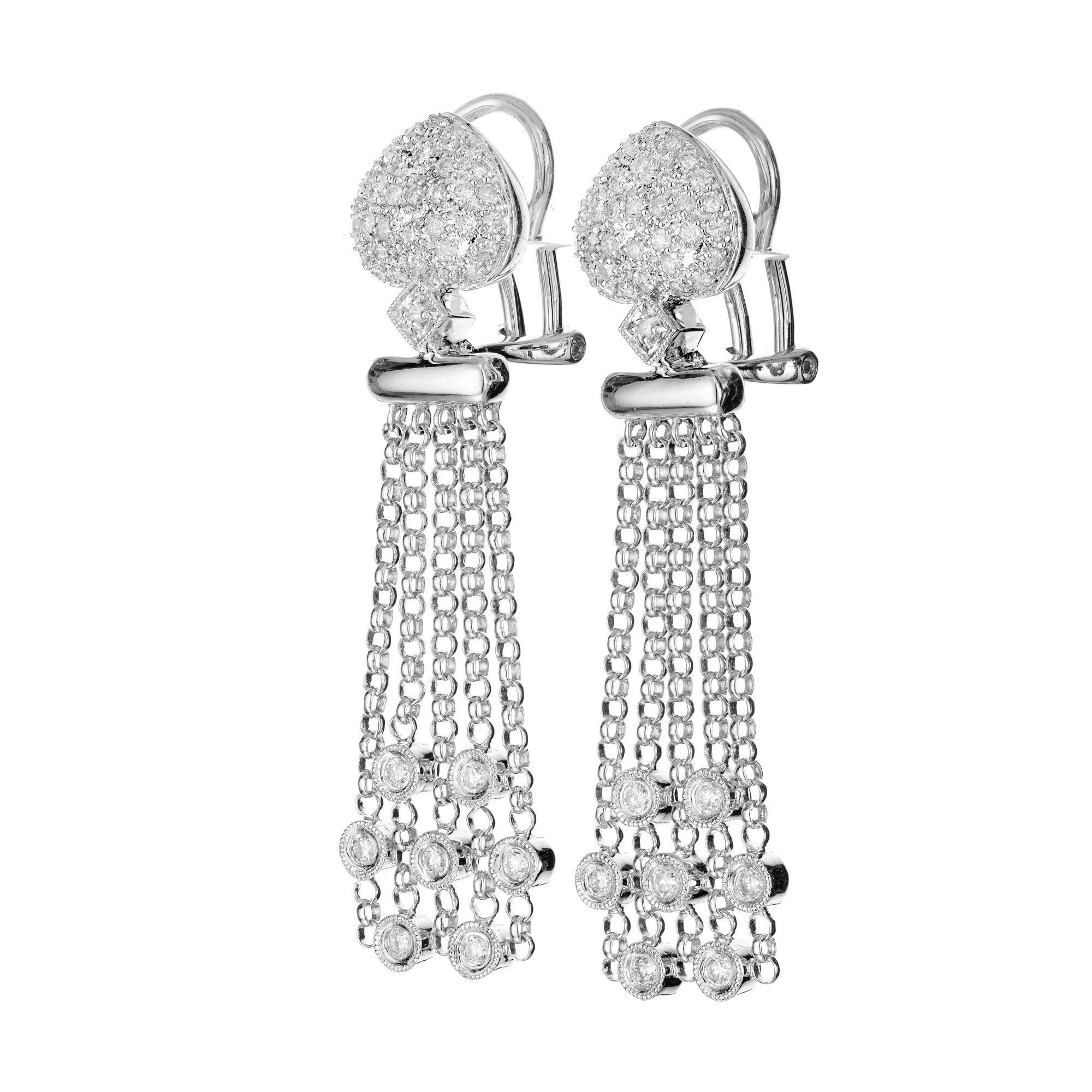Diamond clip post dangle earrings. 82 round diamonds set in 18k yellow and white gold. Upside down heart shaped tops each with 5 drops of bezel set round diamonds. 

82 round diamonds, H-I SI-I approx. .70cts
18k white gold 
18k yellow gold