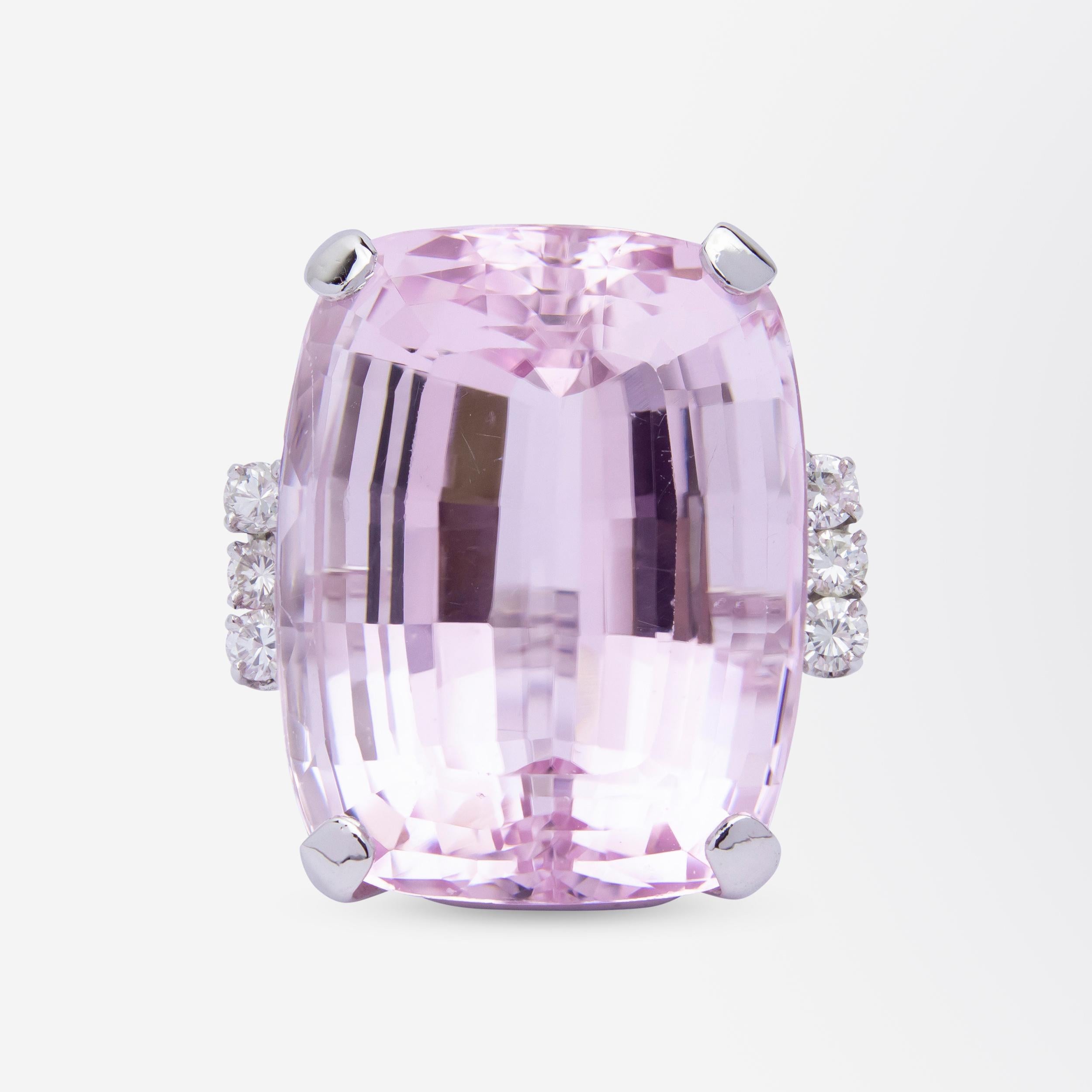 This absolute knuckleduster of a cocktail ring has been crafted from white gold and set with diamonds and a very large central kunzite. The ring which likely dates to the 1960s or 1970s has been handcrafted from 14 karat white gold and is set with